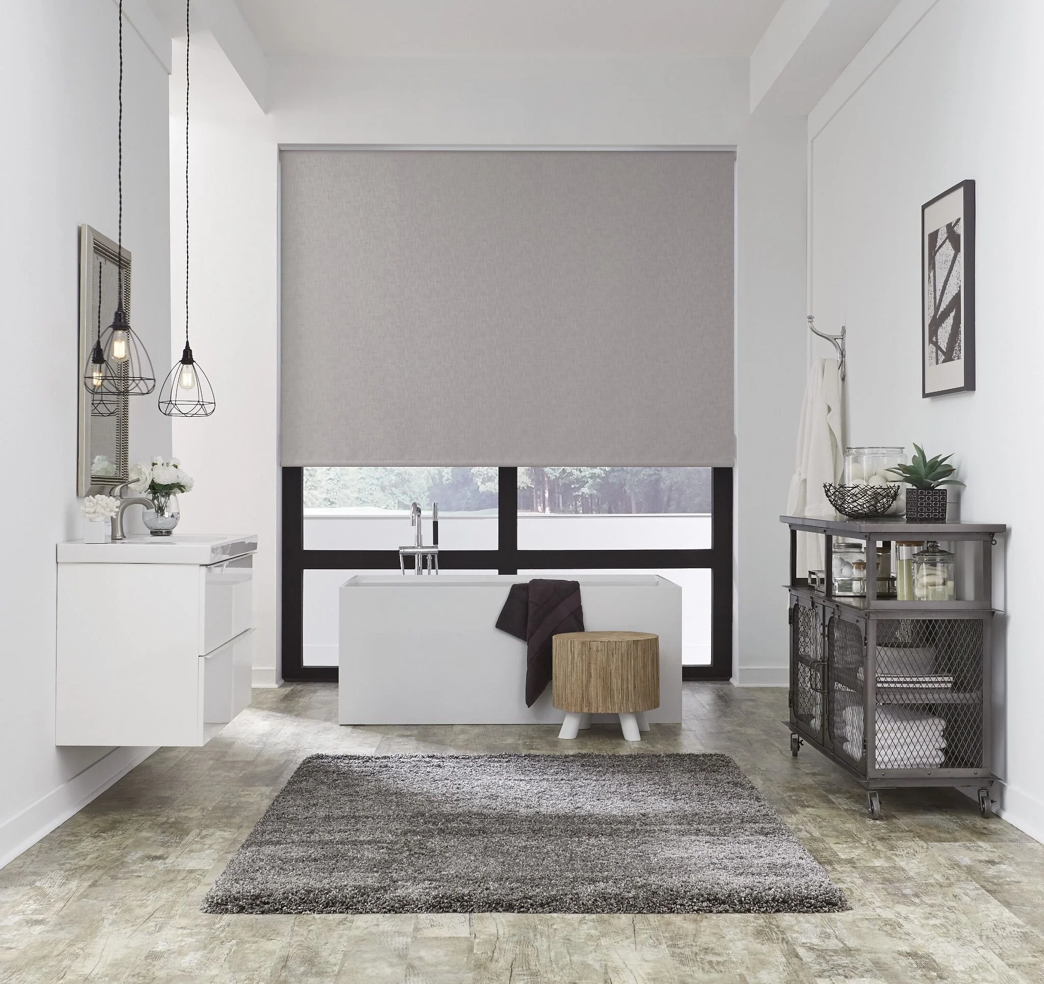Bathroom with motorized roller shades built in.