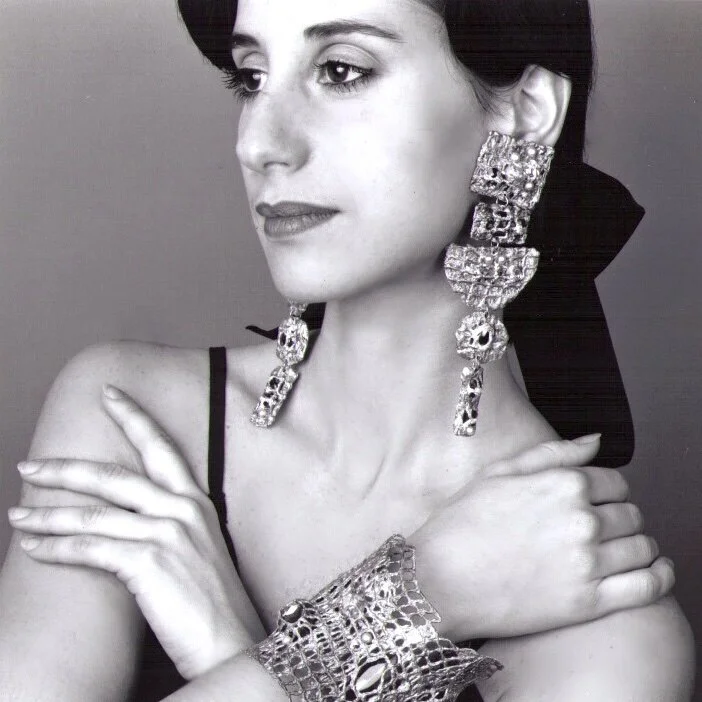 Self portrait photo in black and white of jewelry artist, Pauletta Brooks