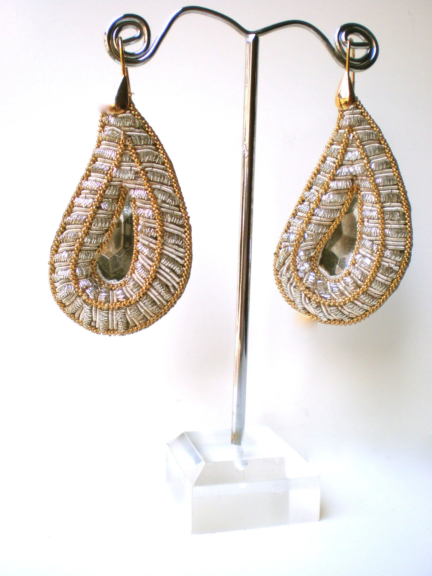 Pauletta Brooks vintage collection Woven appliquè earrings on earring stand