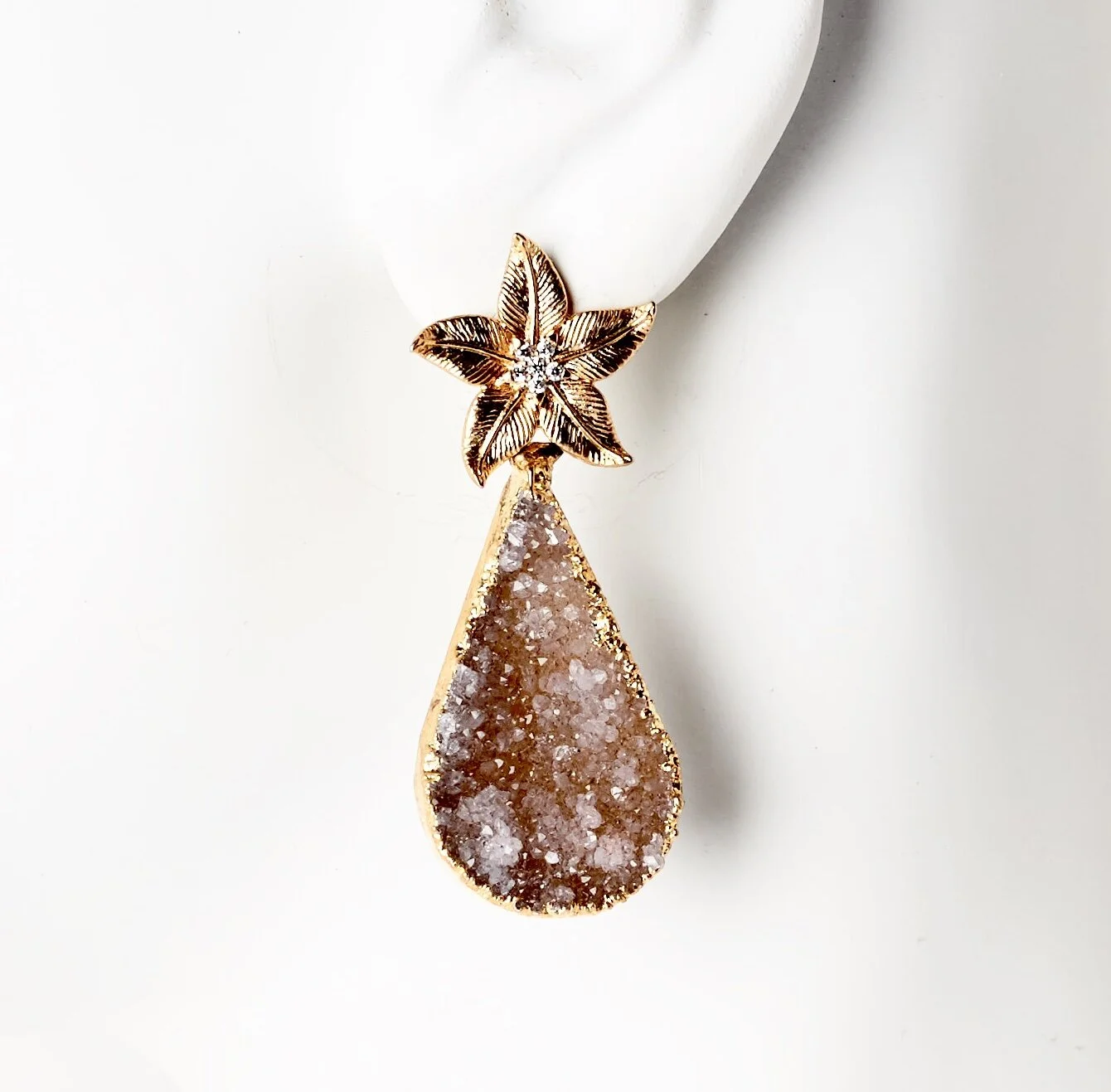 Starlight starbright starfish earrings with teardrop shape pink crystal drops