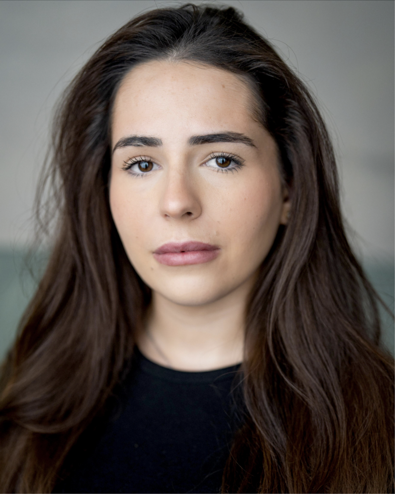 Headshot of Anastasia Hawkes. Anastasia is a White Caucasian female between the ages of 20-30 with brown long straight hair