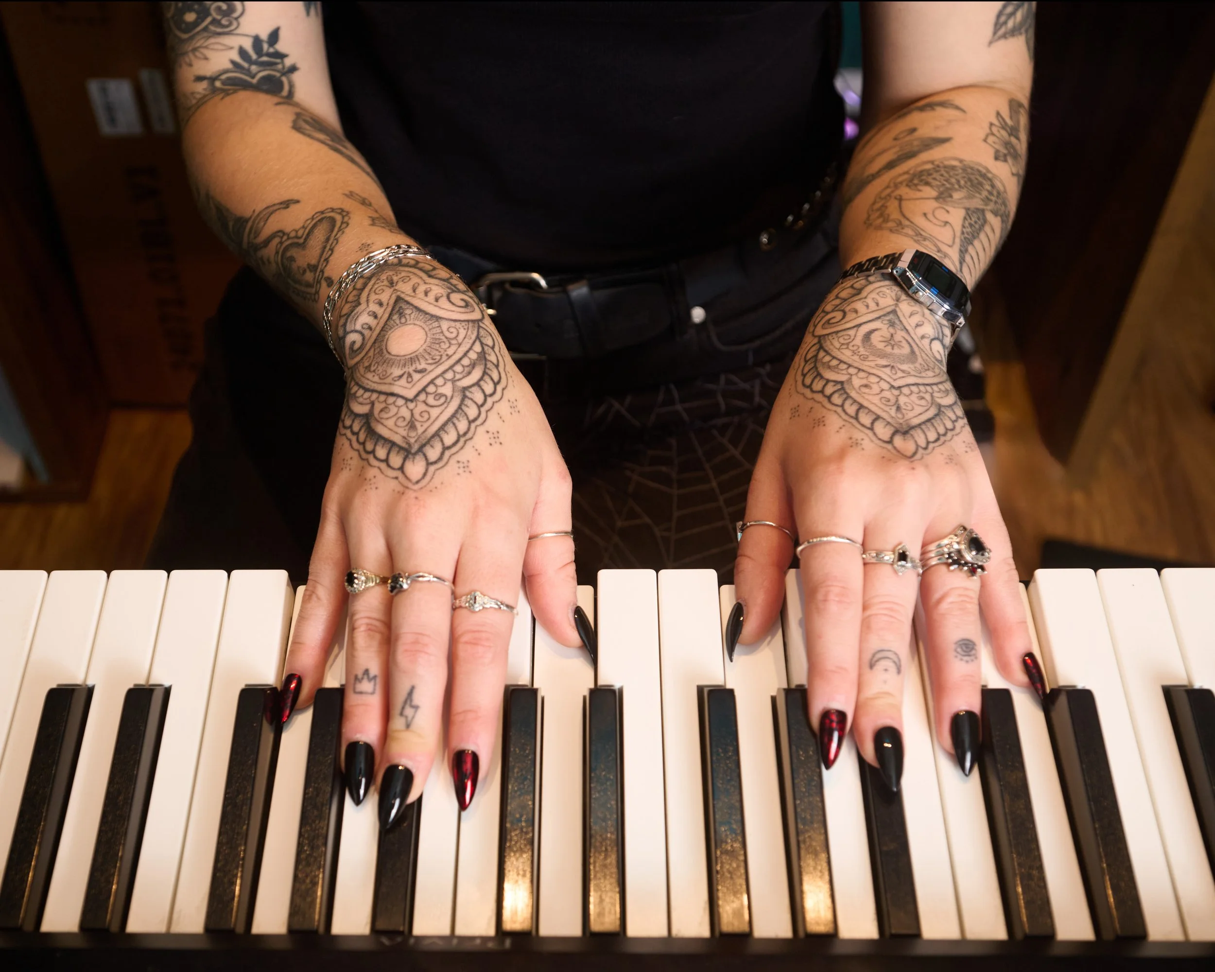 Candi's hand on the piano