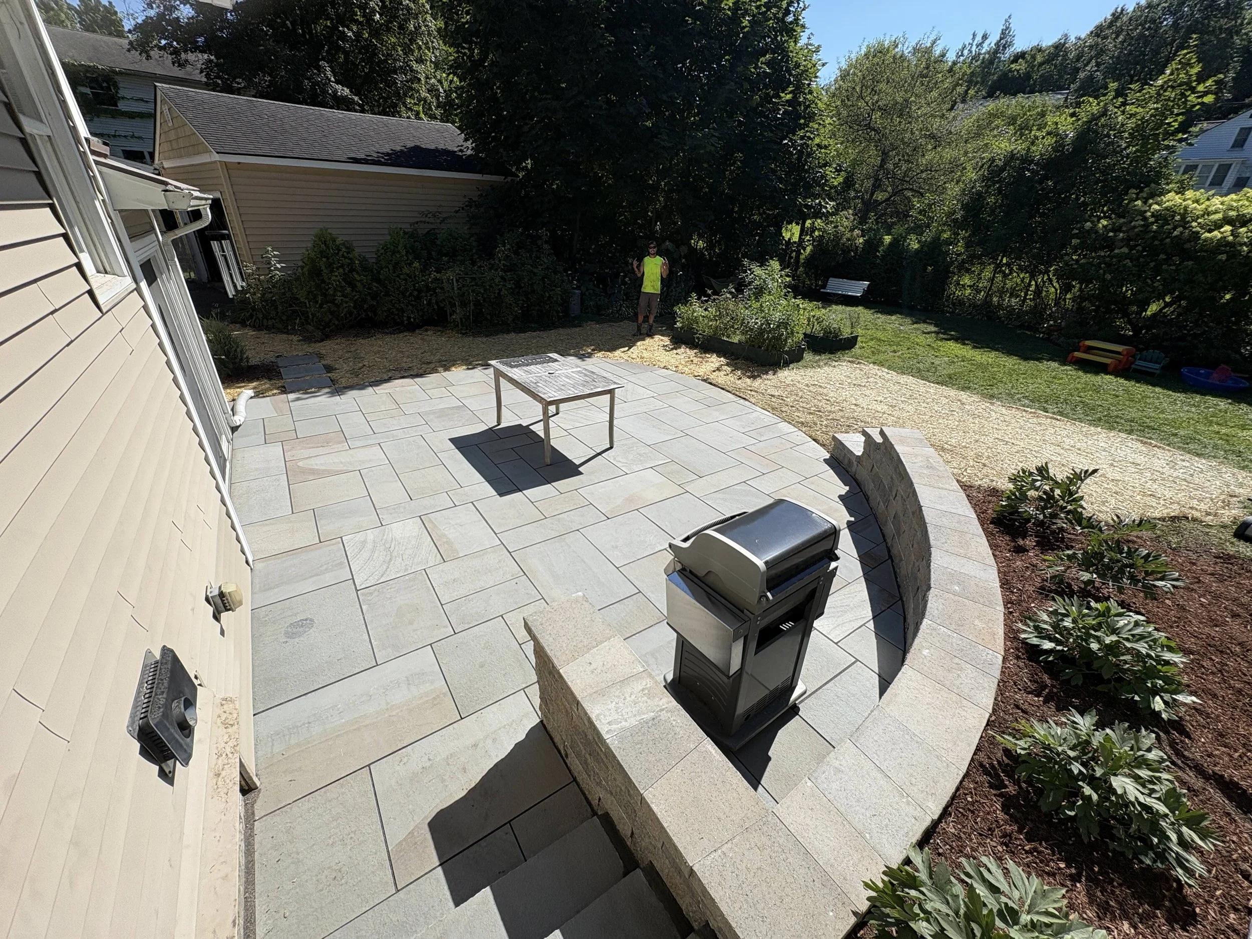 backyard patio built by pinnacle properties in vermont