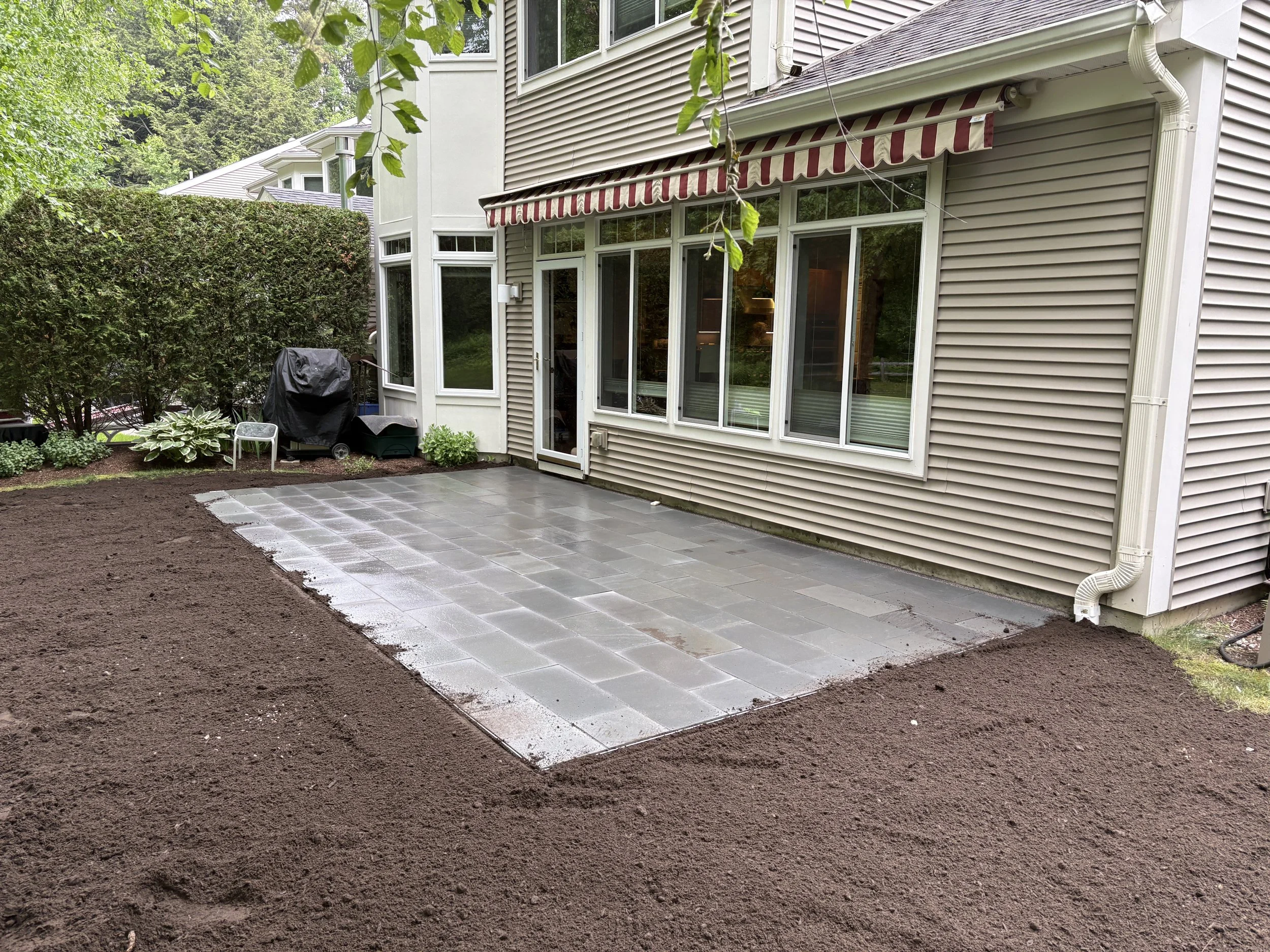 custom patio being built for a home in vermont
