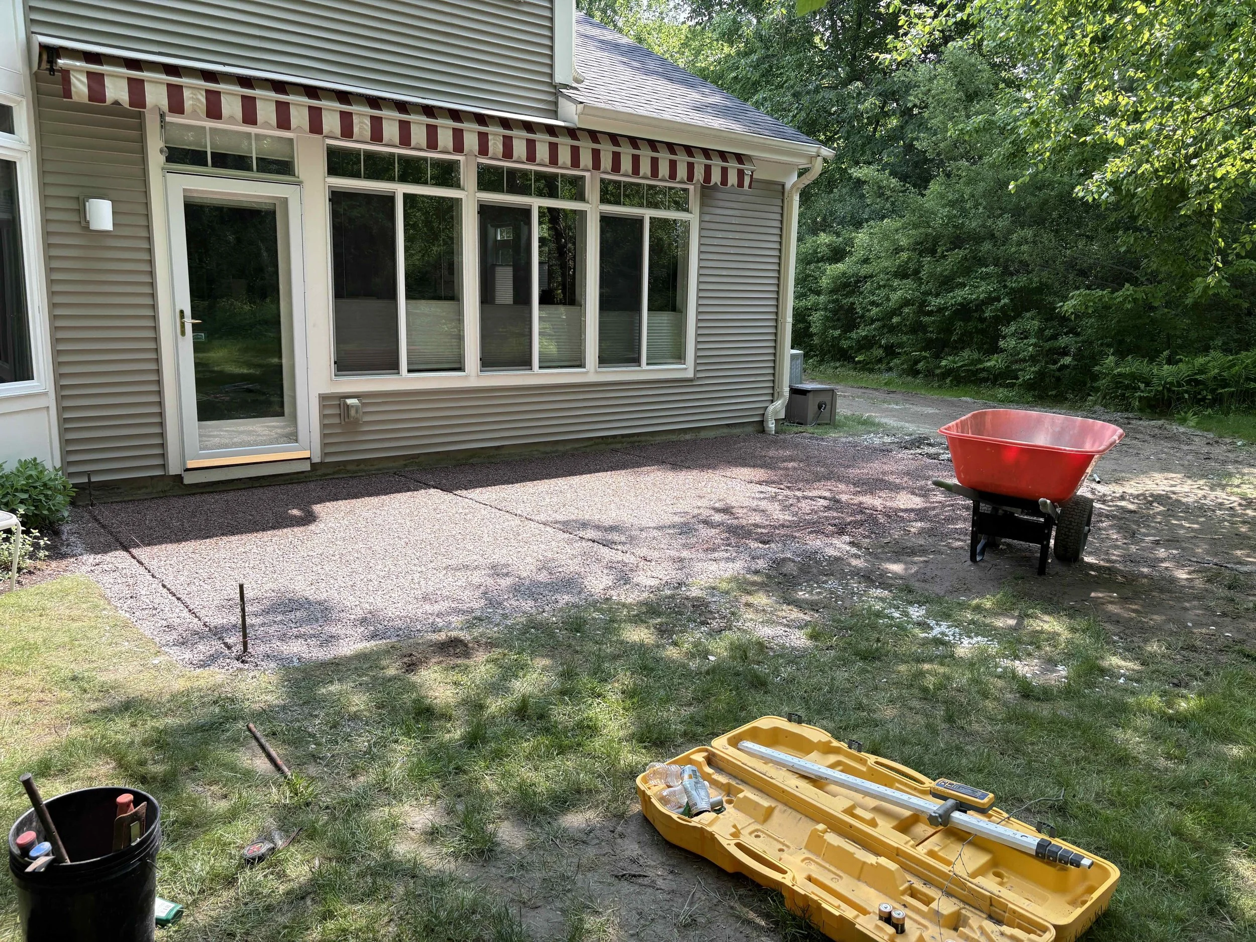 image showing backyard prep and planning before a patio installation