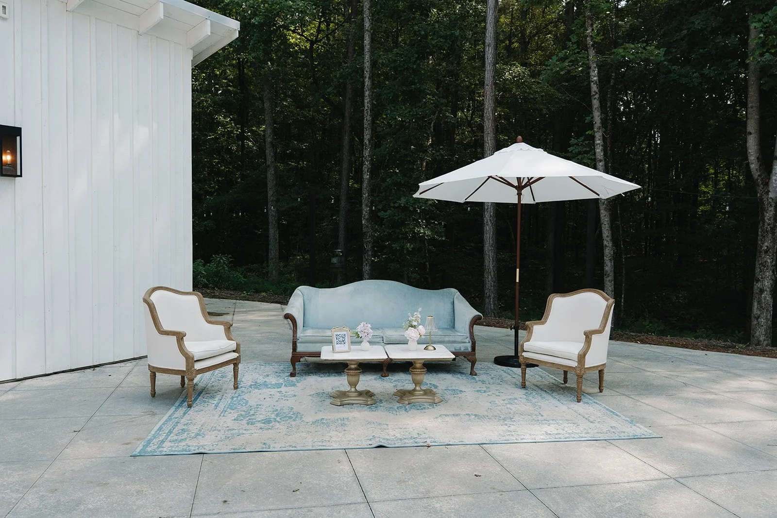 Marissa Rug, Umbrella, Danica + Claude Chairs, Shelby + Sloane Chairs, Daphne Sofa $480