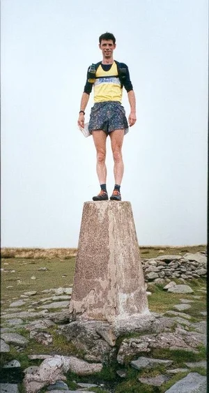 Garry on High Street trig point.