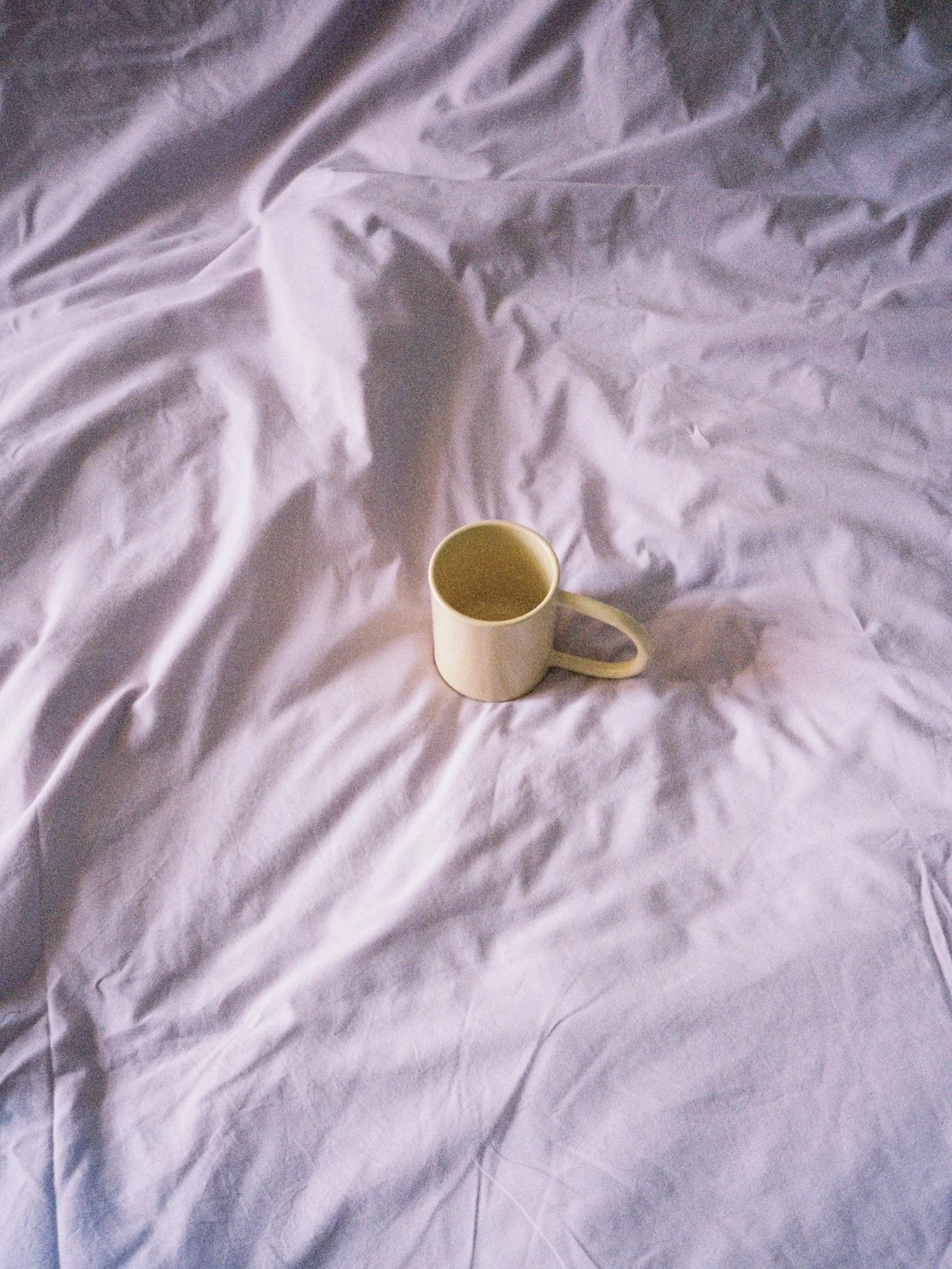 Breakfast in bed featuring the tall mug in butter yellow &mdash; shot both on analogue and by @franziska.vehring