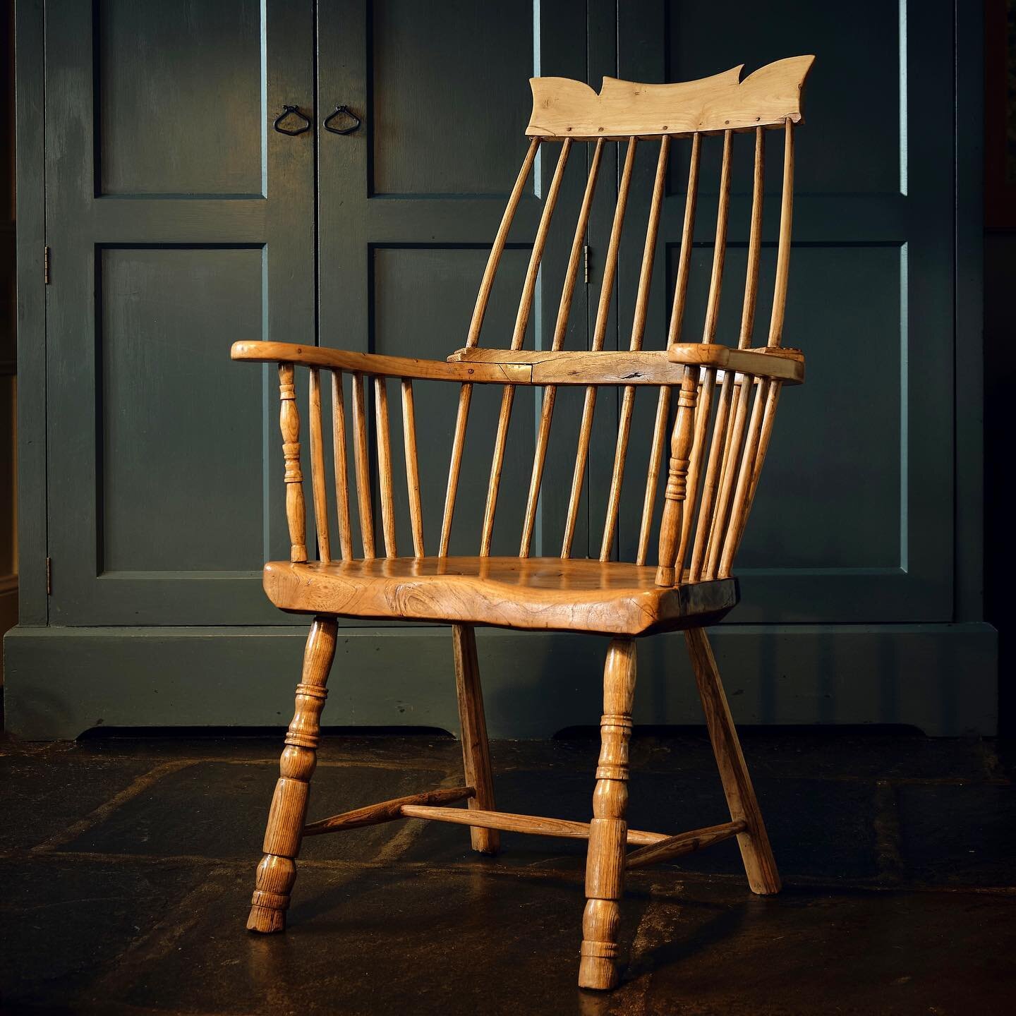 A substantial Welsh stick back armchair!

Made from a variety of woods: sycamore for the shaped cresting and arms, elm for the three inch thick seat and, with the exception of a couple of oak sticks in the comb, the remaining elements are all of ash,