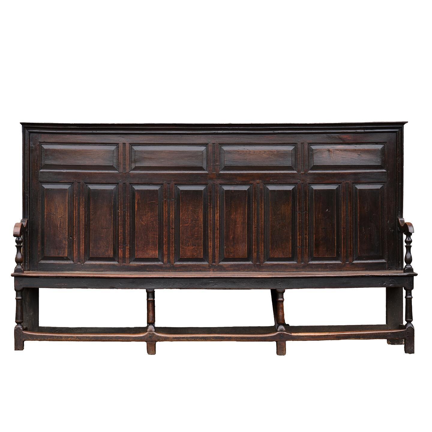 A magnificent dated Welsh high back oak settle.

Most unusually, there are initials and a date in tiny lettering,inscribed into the centre of the top rail just beneath the moulding &ldquo;E. W. 1745&rdquo;.

The settle is for sale at &pound;3,950. Pl