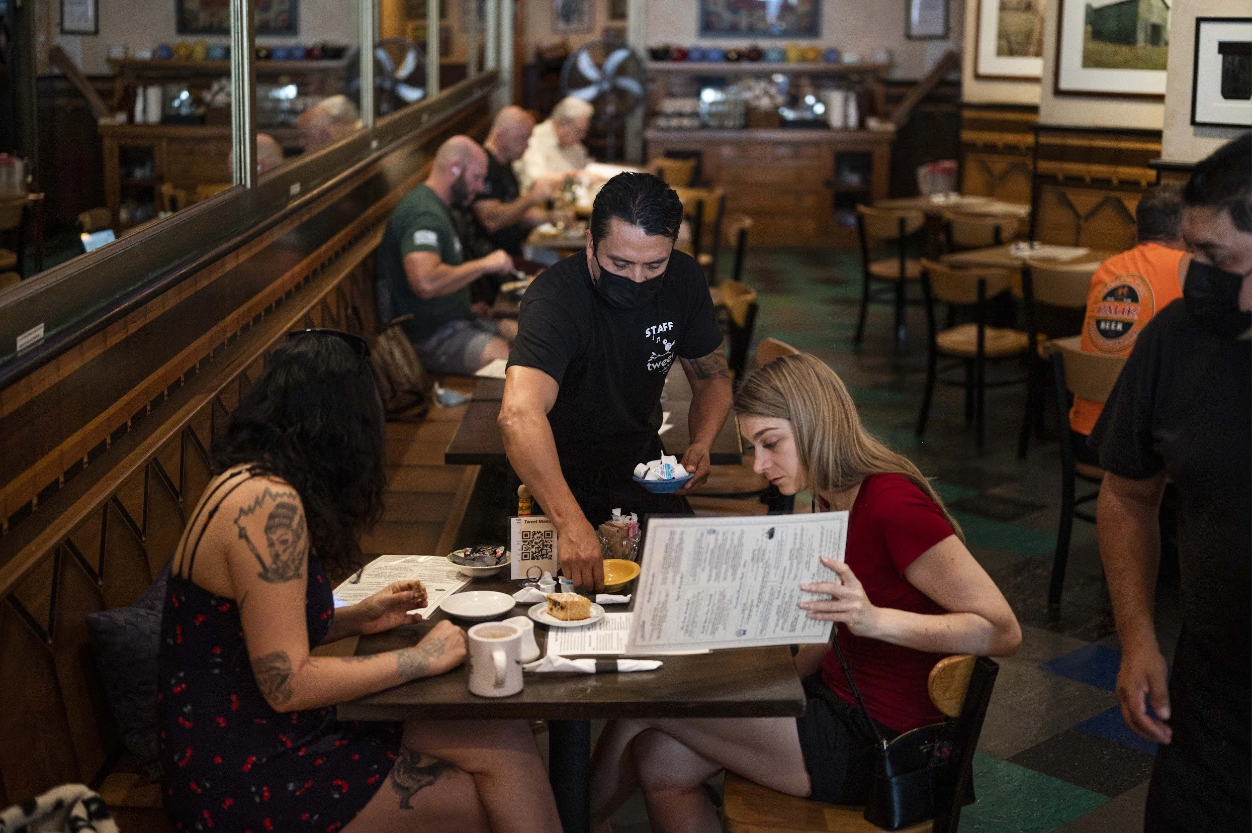 Line shot of Tweet Bench with Focus on Carlos and Customers.jpg