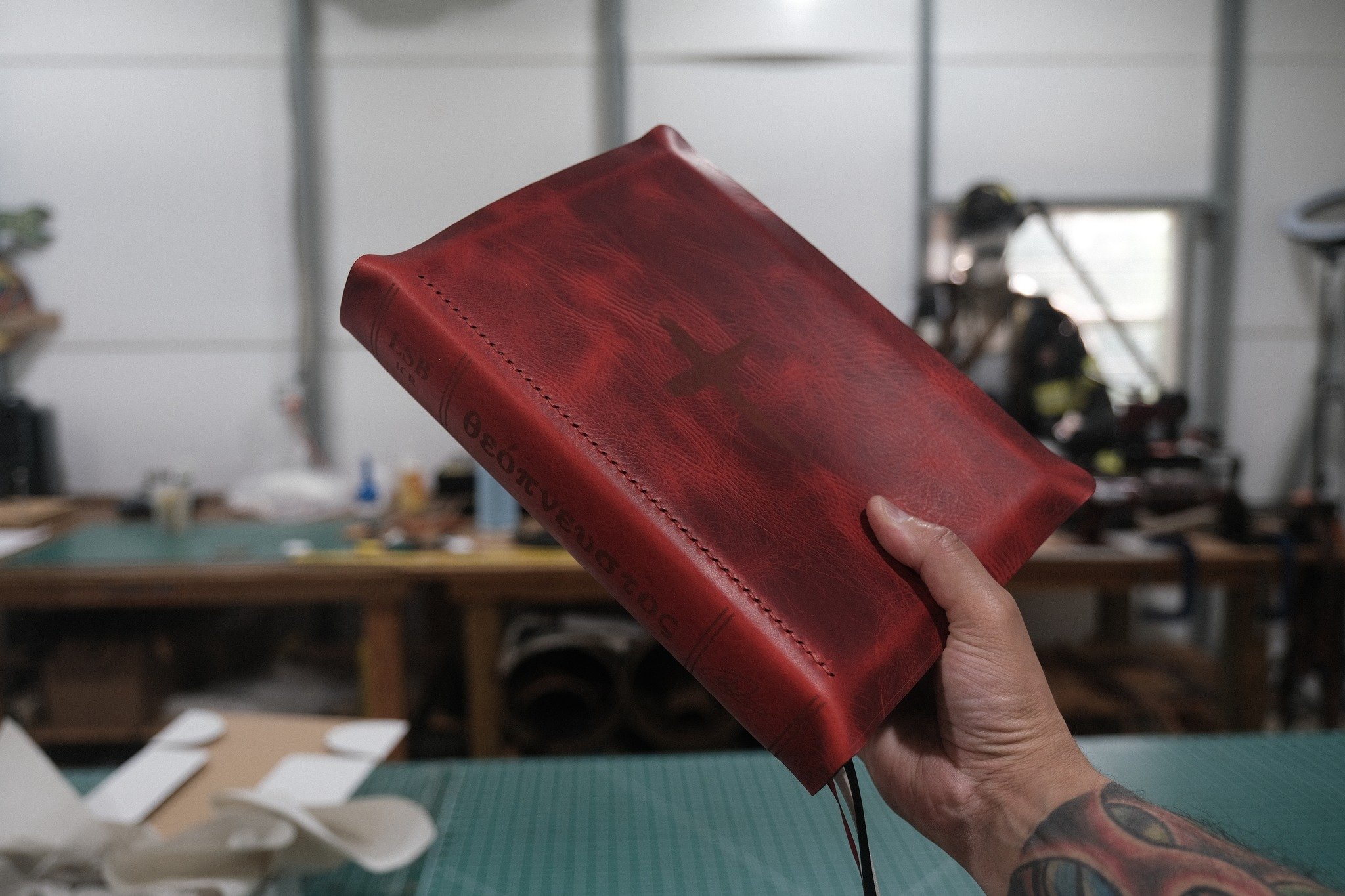 The Sofield LSB ICR Theopneustos Premium Bible in Red is now available in Badalassi Carlo Waxy Red. It features Ritza Tiger Thread in Red, paired with Black, Antique White, and Scarlet ribbons, and the horizontal spine engraving LSB ICR &theta;&epsil