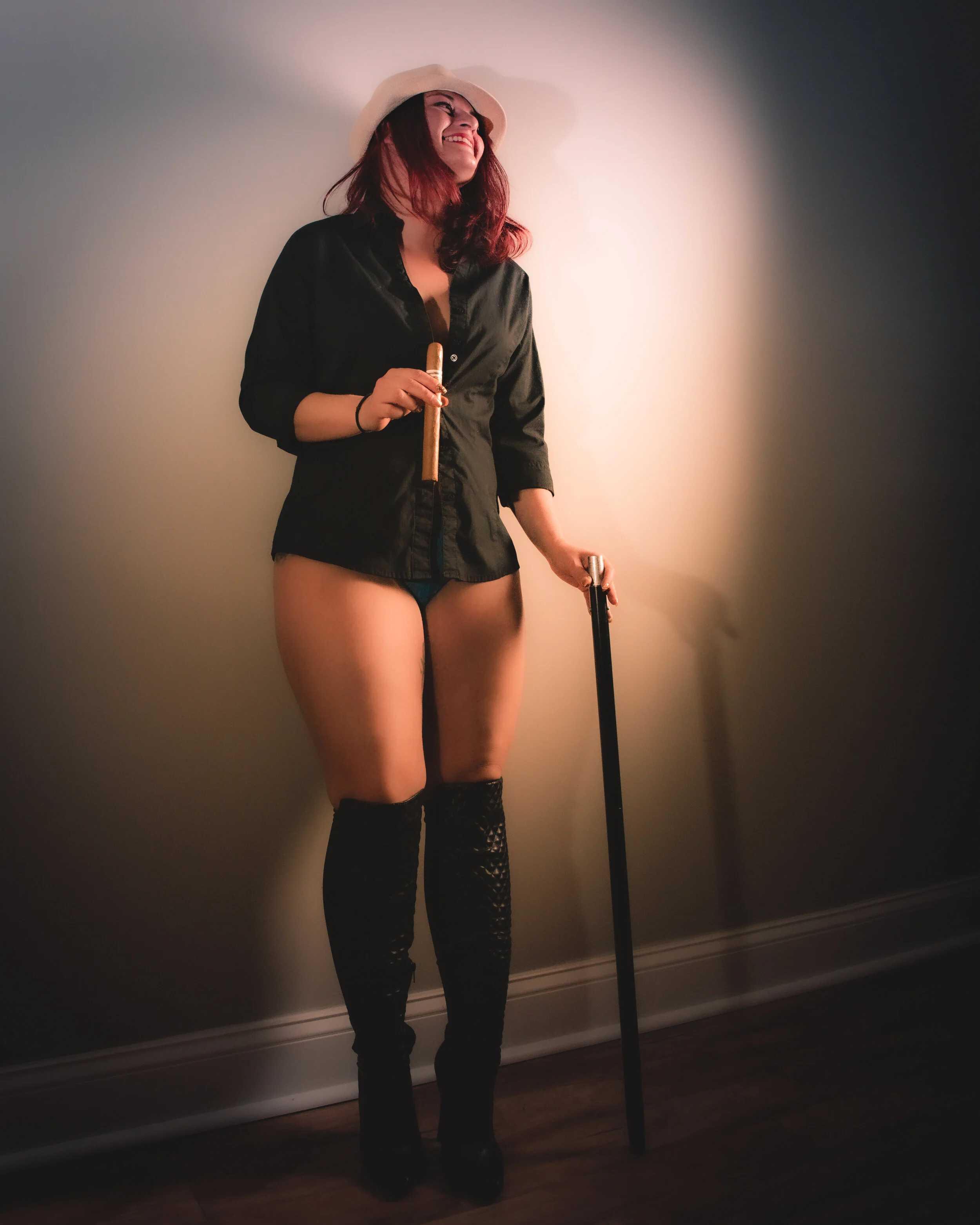 confident woman photographed during boudoir session