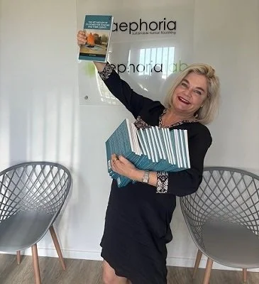 dr-julia-kukard-with-her-books