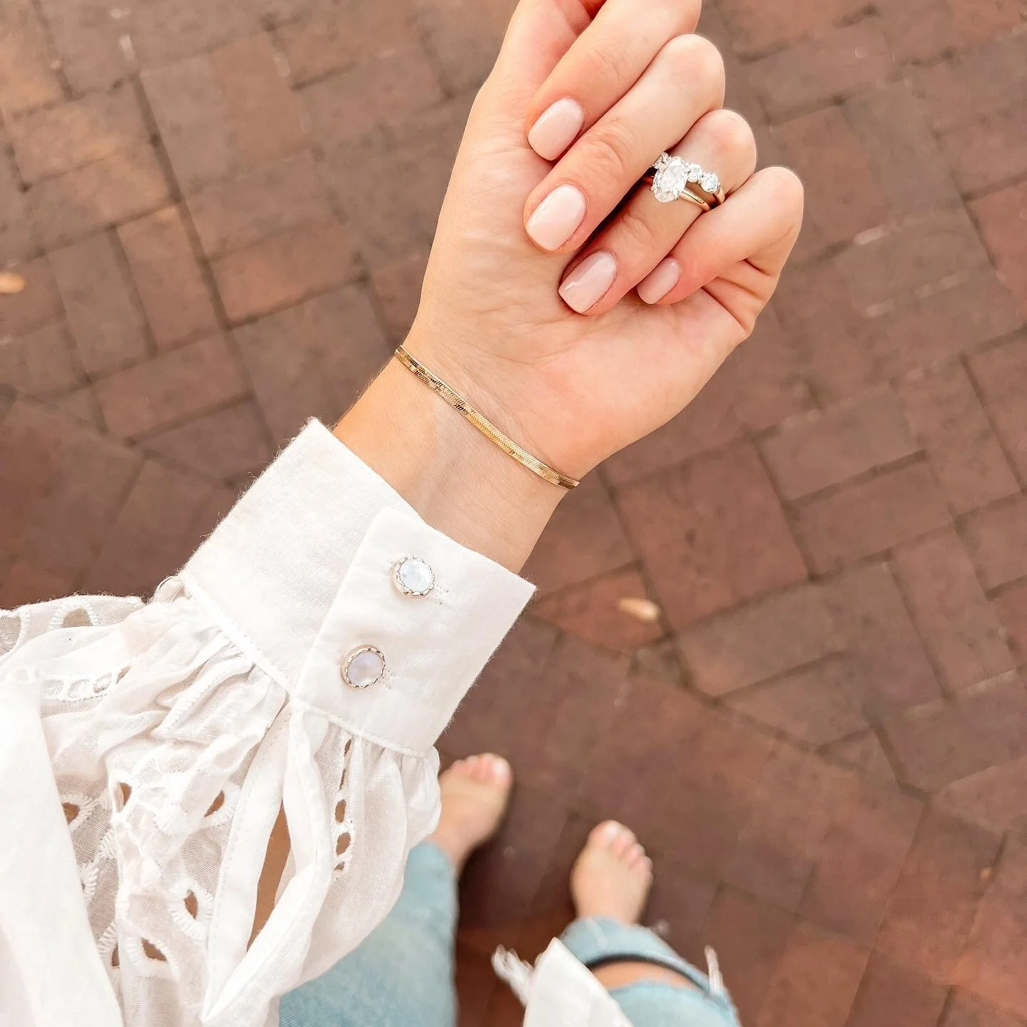 It&rsquo;s all in the details 🤍 I&rsquo;ve been focusing on styling classic, timeless pieces that never go out of style! 

Classic gold bracelet - @llumejewelry 
Nails - @rosecouturenailbar (shade ANC 177)
Rings - @diamondsdirect 
Top - @petalandpup