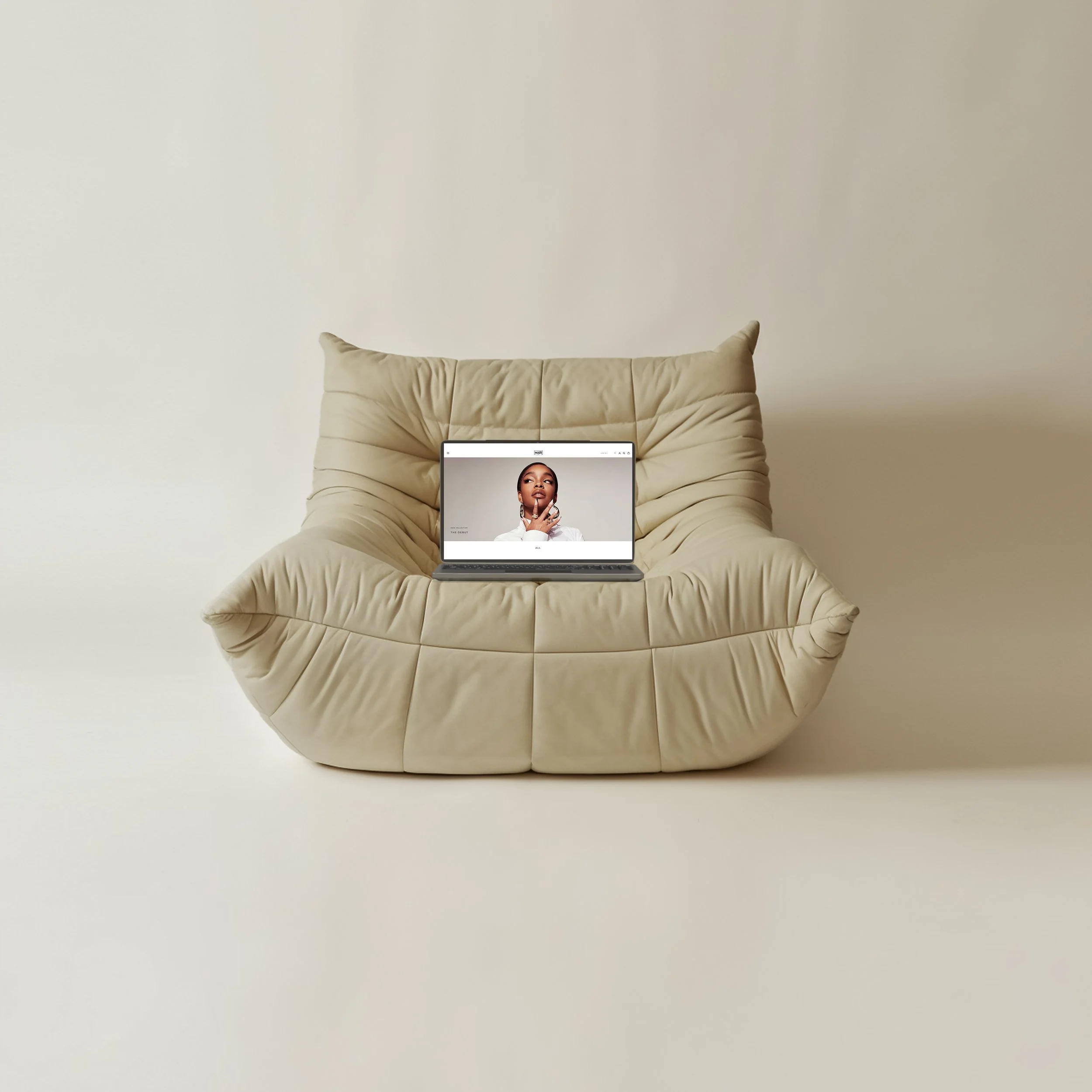 Custom Shopify homepage design for Mari by Marsai luxury beauty brand displayed on MacBook mockup.