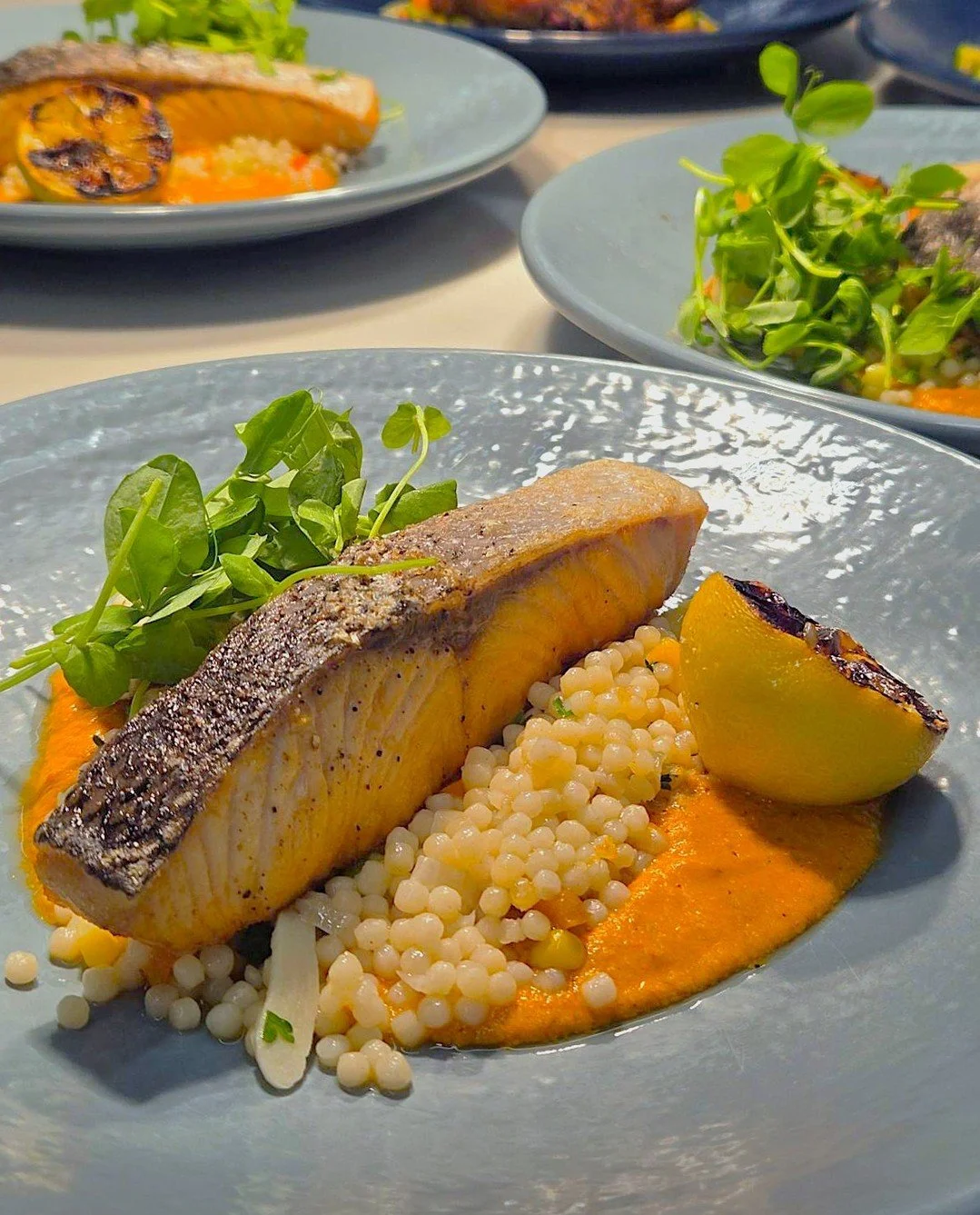 The days are getting shorter, but there's still time to make the most of summer! 
Our Seared Salmon is here to soak up the season with perfectly seared salmon, vibrant flavors, and all the fresh vibes your lunch deserves. It's the catch of the day, e