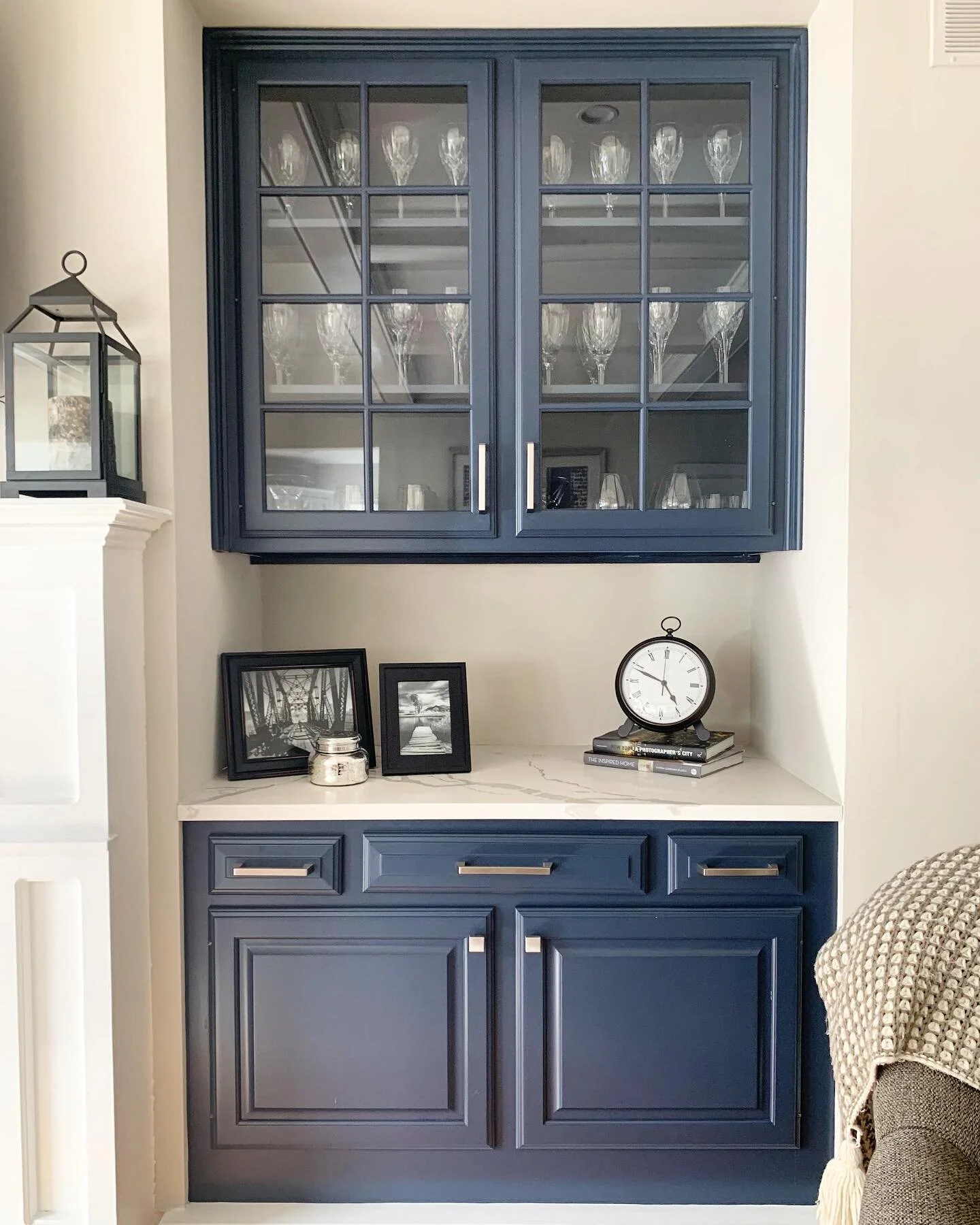 Decor &amp; Decanting 🤍

Loving the rich Hale Navy cabinet mixed with a balance of black &amp; neutrals.

#benjaminmoore 
#halenavy 
#waterford 
#homeorganizing 
#homedecor
#winecabinet 
#wineglass 
#placeandpurpose