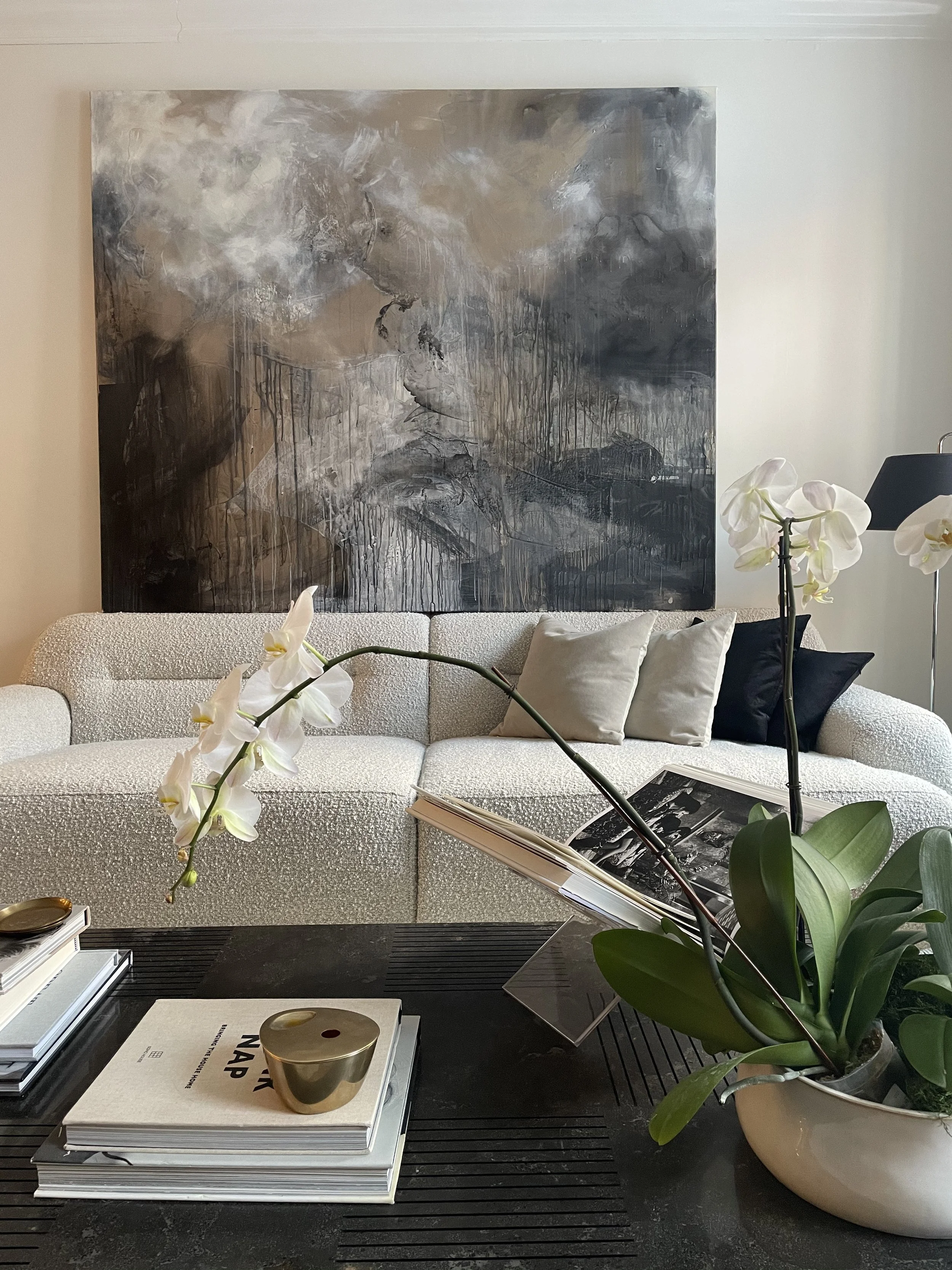 Large Ethereal piece displayed over sofa 