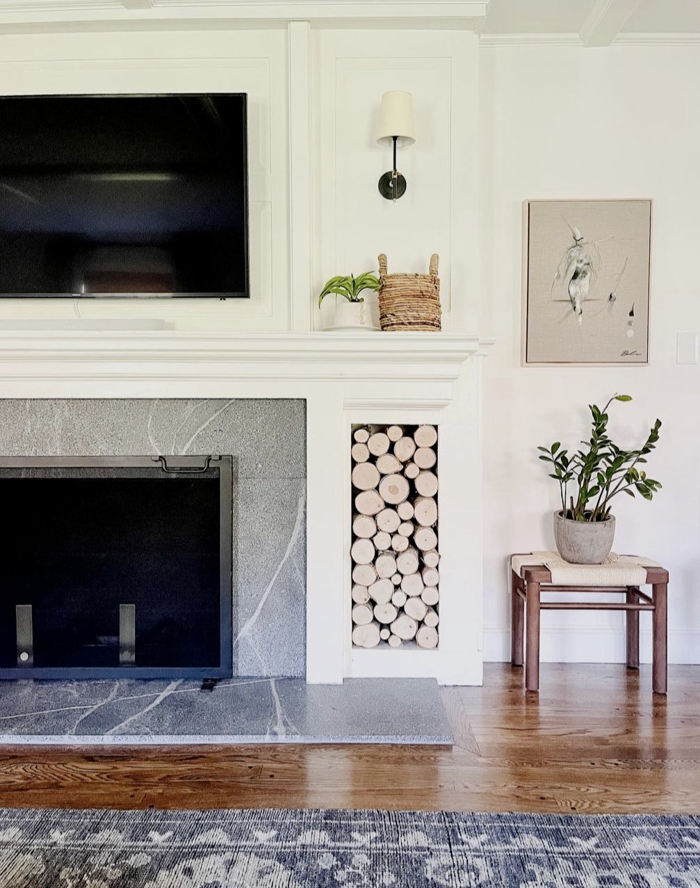 Faceless painting in a styled home 