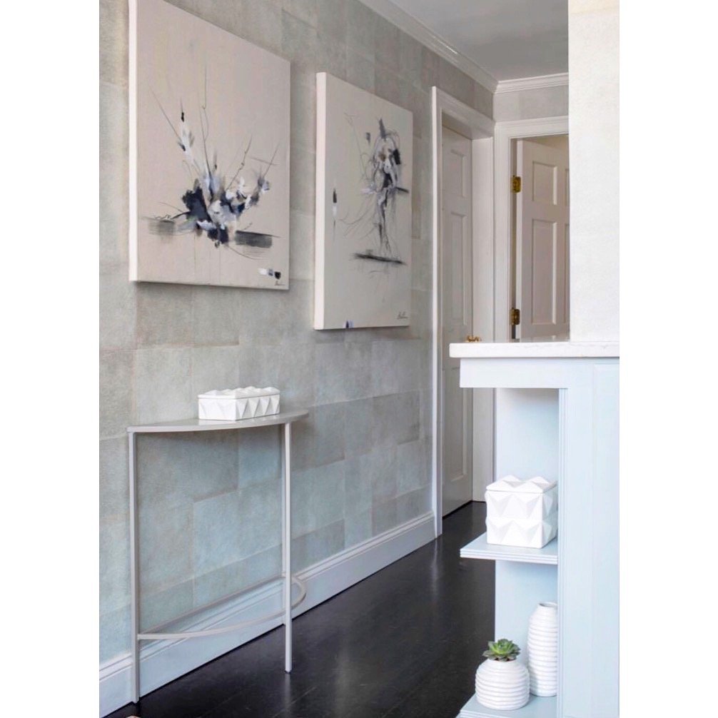 Faceless paintings in a Boston apartment 