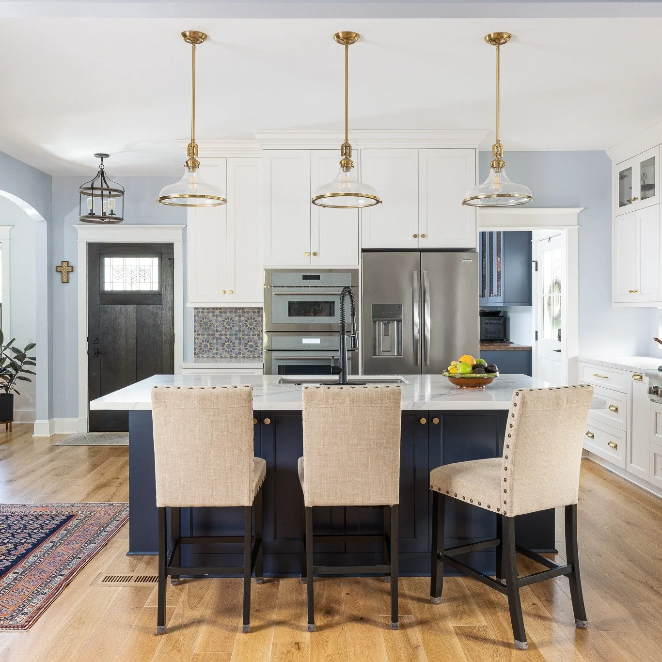 A timeless contrast of bright white and deep blue, brought to life with a statement backsplash. This kitchen proves that bold color can still feel beatifically refined. 💙

#KitchenInspiration #AlexandriaVA #TileDesign #InteriorDesign #DesignDetails 