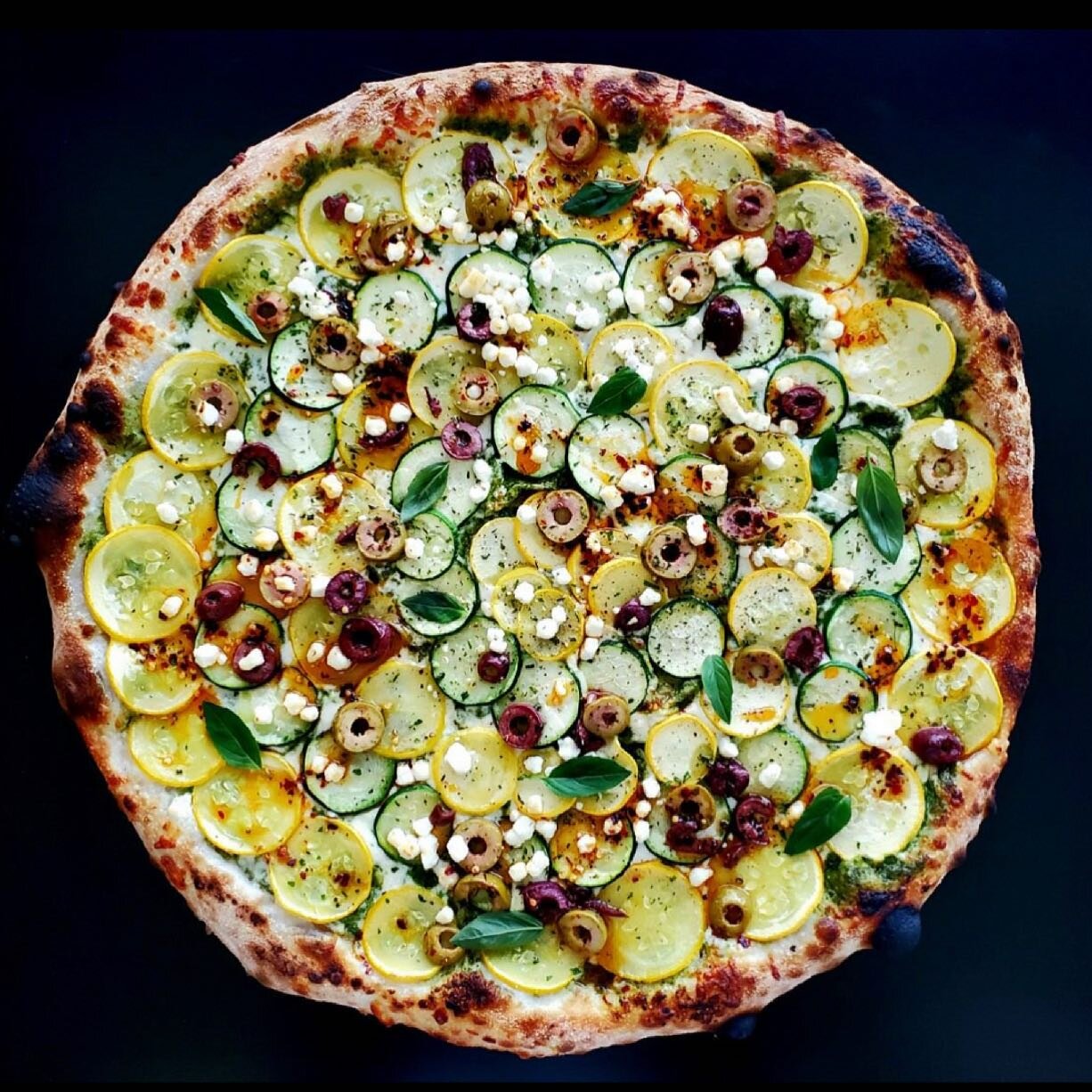 THIS IS A FEATURE. NY Style with Pesto, Zucchini, Goat Cheese, Olives, Chili Oil, Basil $24 Open today at 4pm