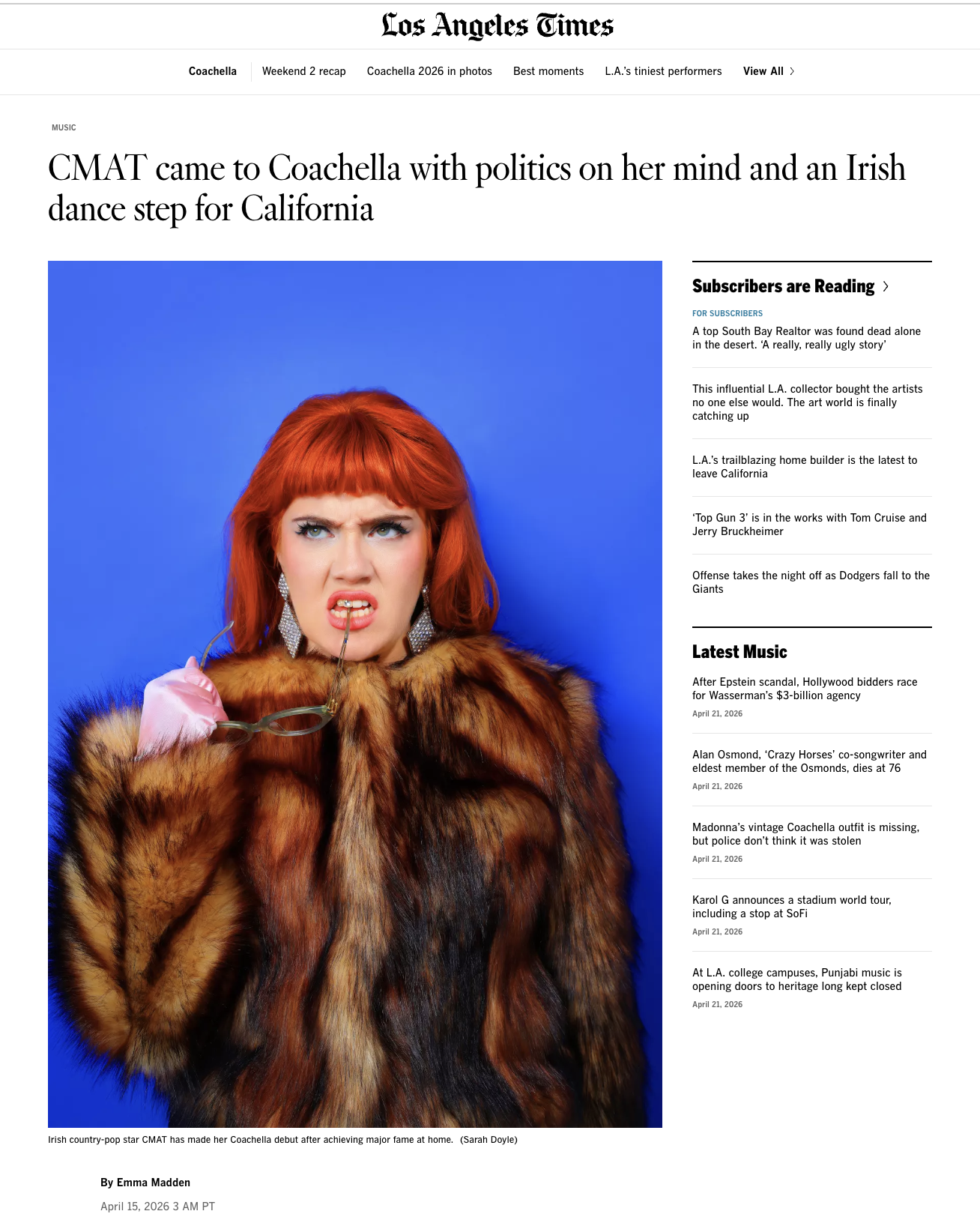 A woman with bright red hair and a fur coat holding earrings and a pair of glasses, against a blue background.