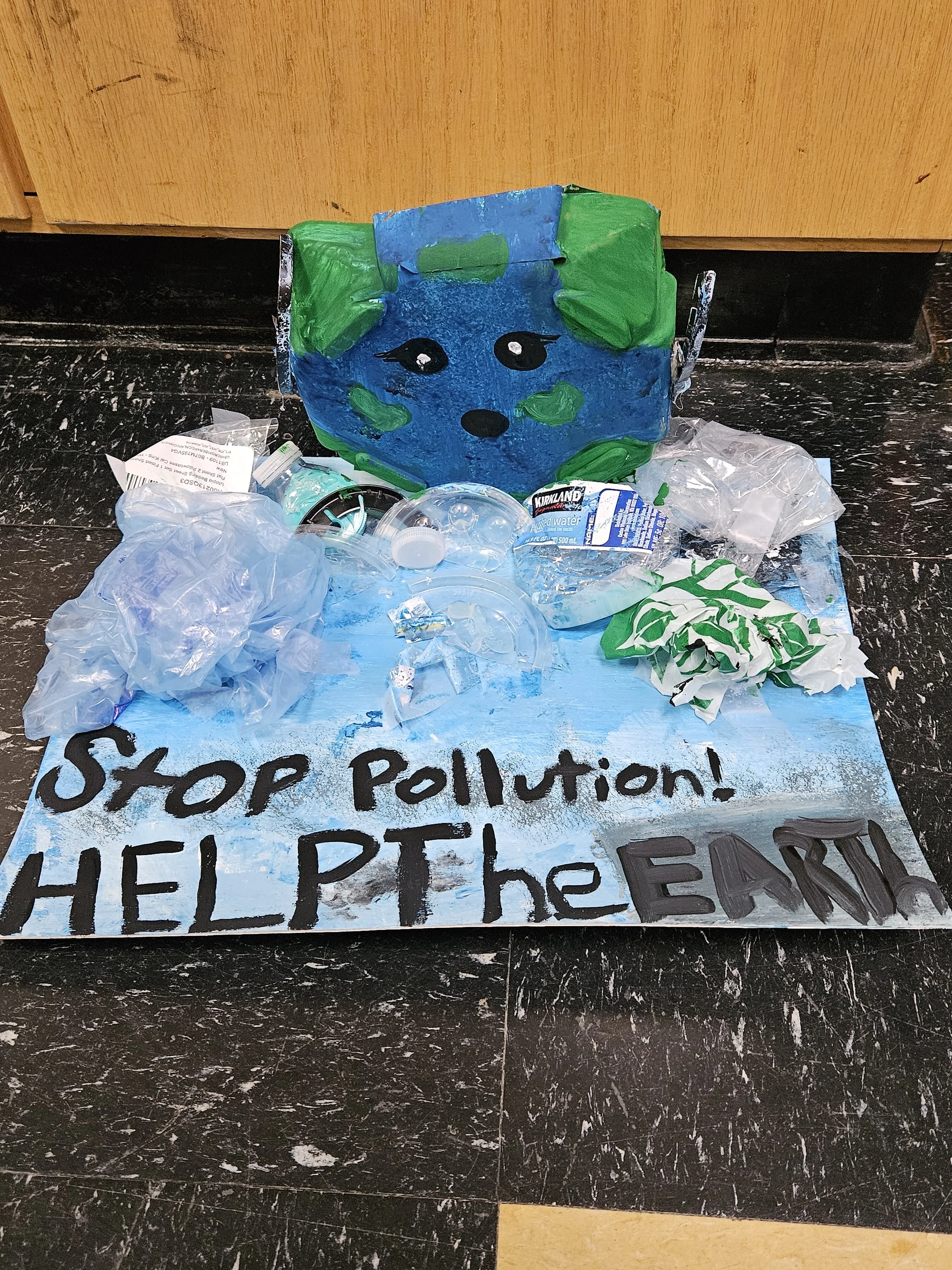 Students create art from plastic trash to learn about waste management with our "Life of a Water Bottle" lesson