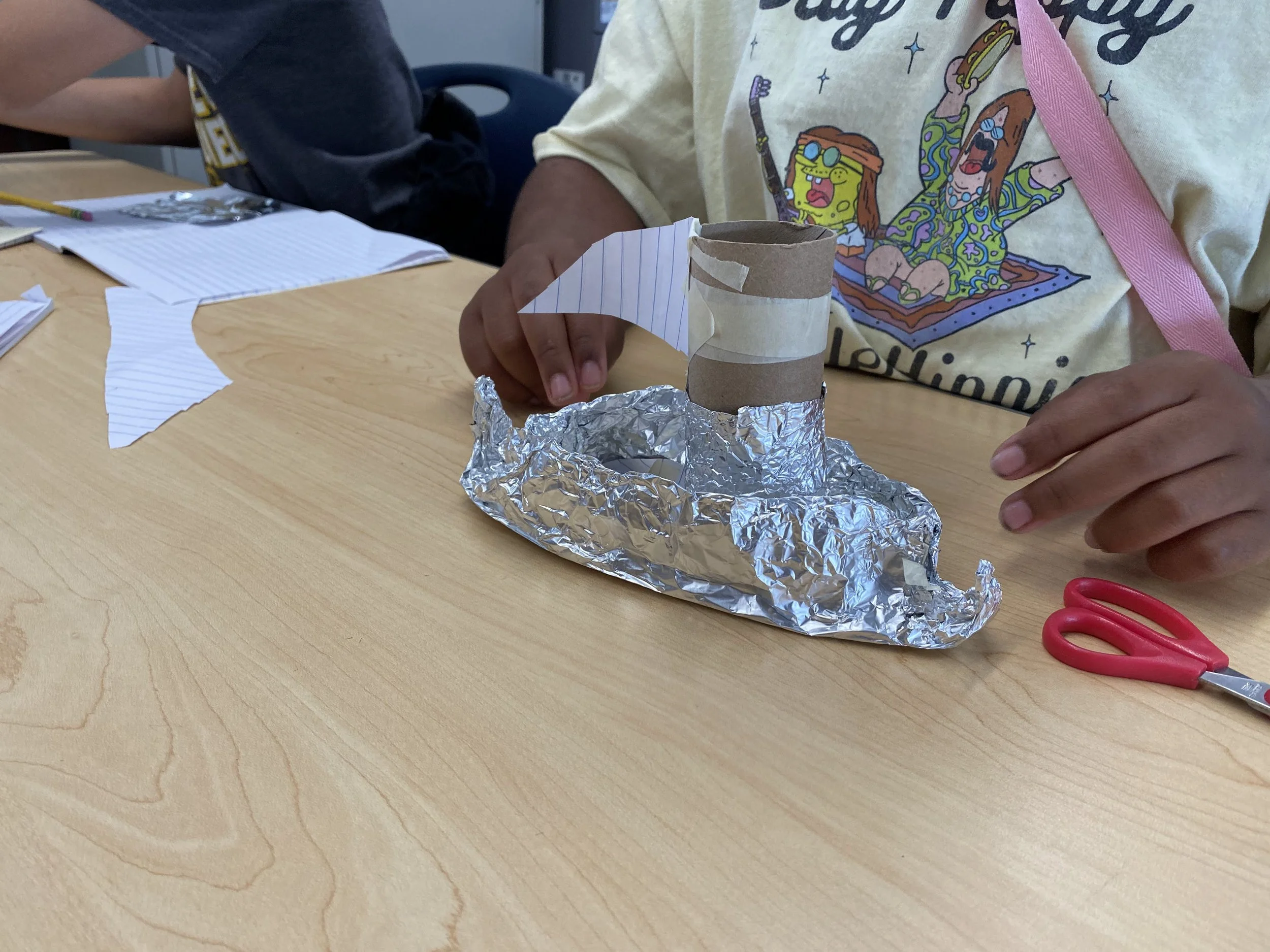 A student's creation for the "Float Away" lesson teaching about air and transportation