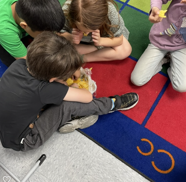 Students learn about renewable resources with our "Sunshine Power" lesson b using a solar oven to make tasty nachos!