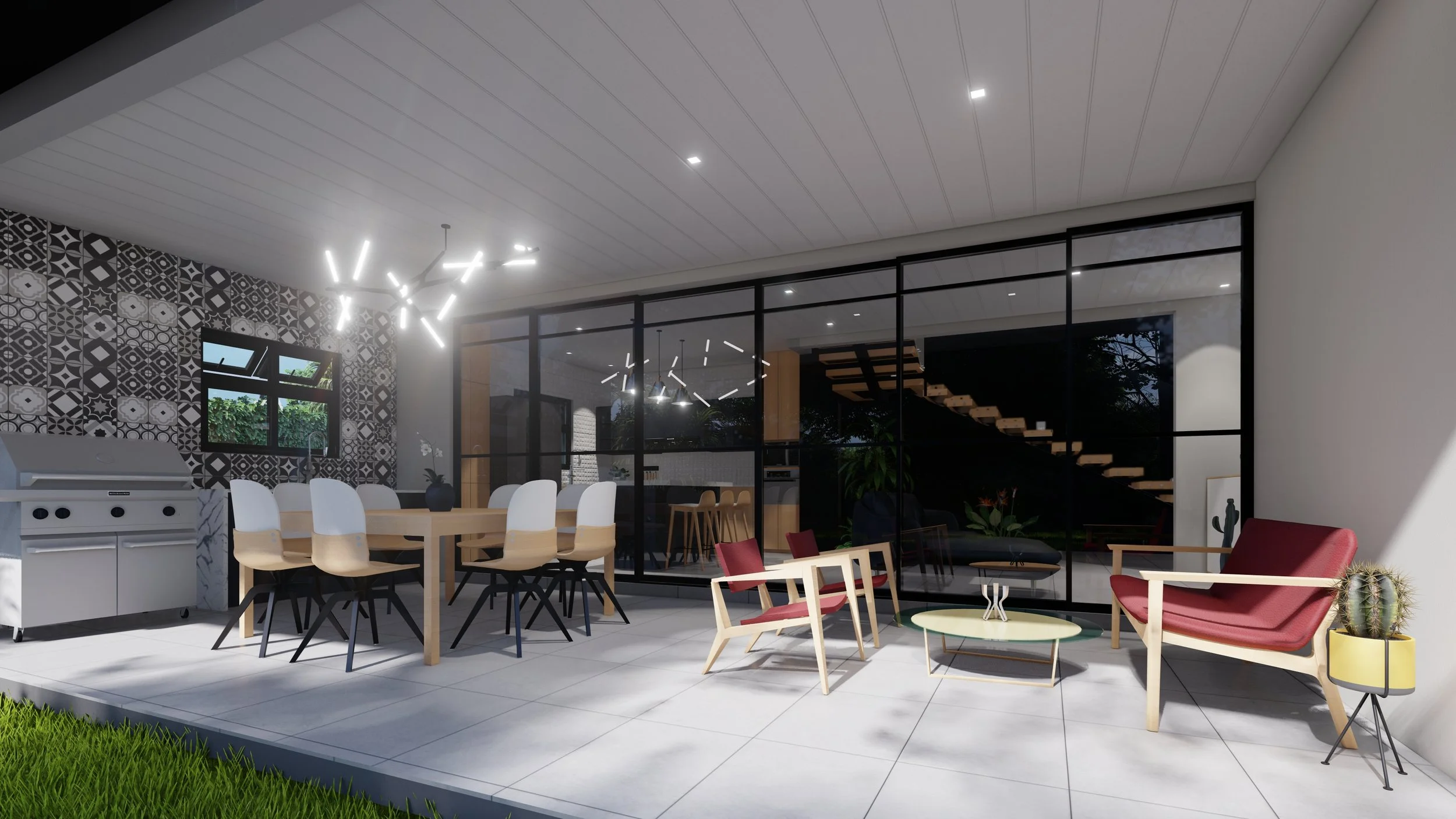 Terraza con área para BBQ, comedor y sala de estar, conectada con la cocina y sala de la casa a través de puertas de vidrio corredizas en 6 paños.