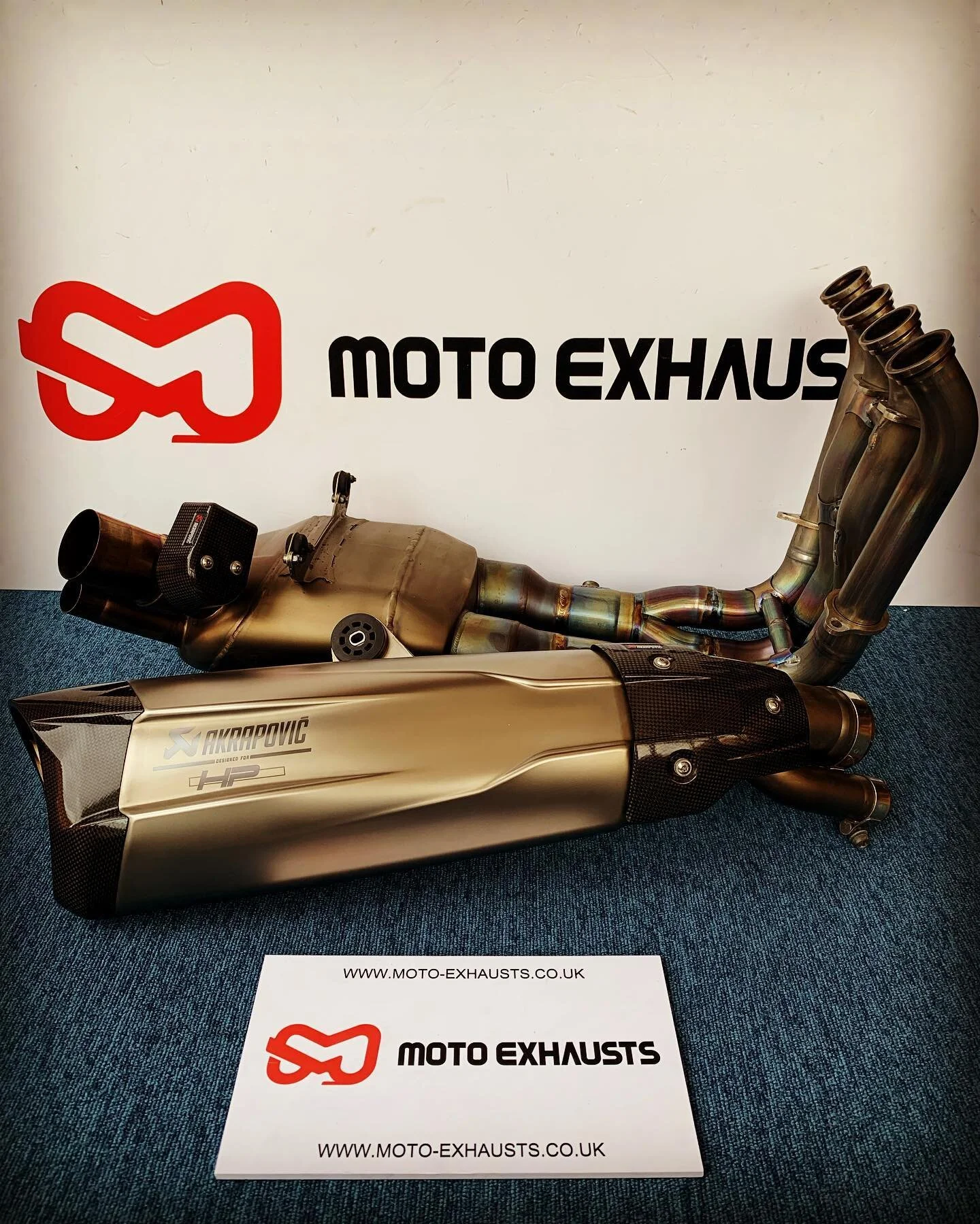 BMW S1000rr K46 Akrapovic HP Titanium Full Exhaust System - This Akrapovic HP exhaust system has been designed exclusively by Akrapovic for BMW Motorrad. More power, more torque, a more enchanting sound and less weight, as well as a high-end design a