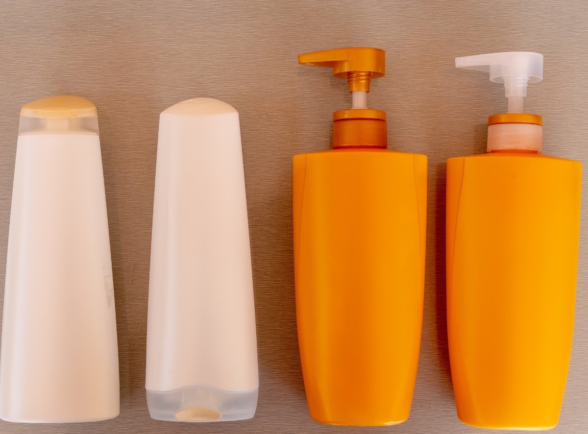 Photo of four beauty product plastic bottles