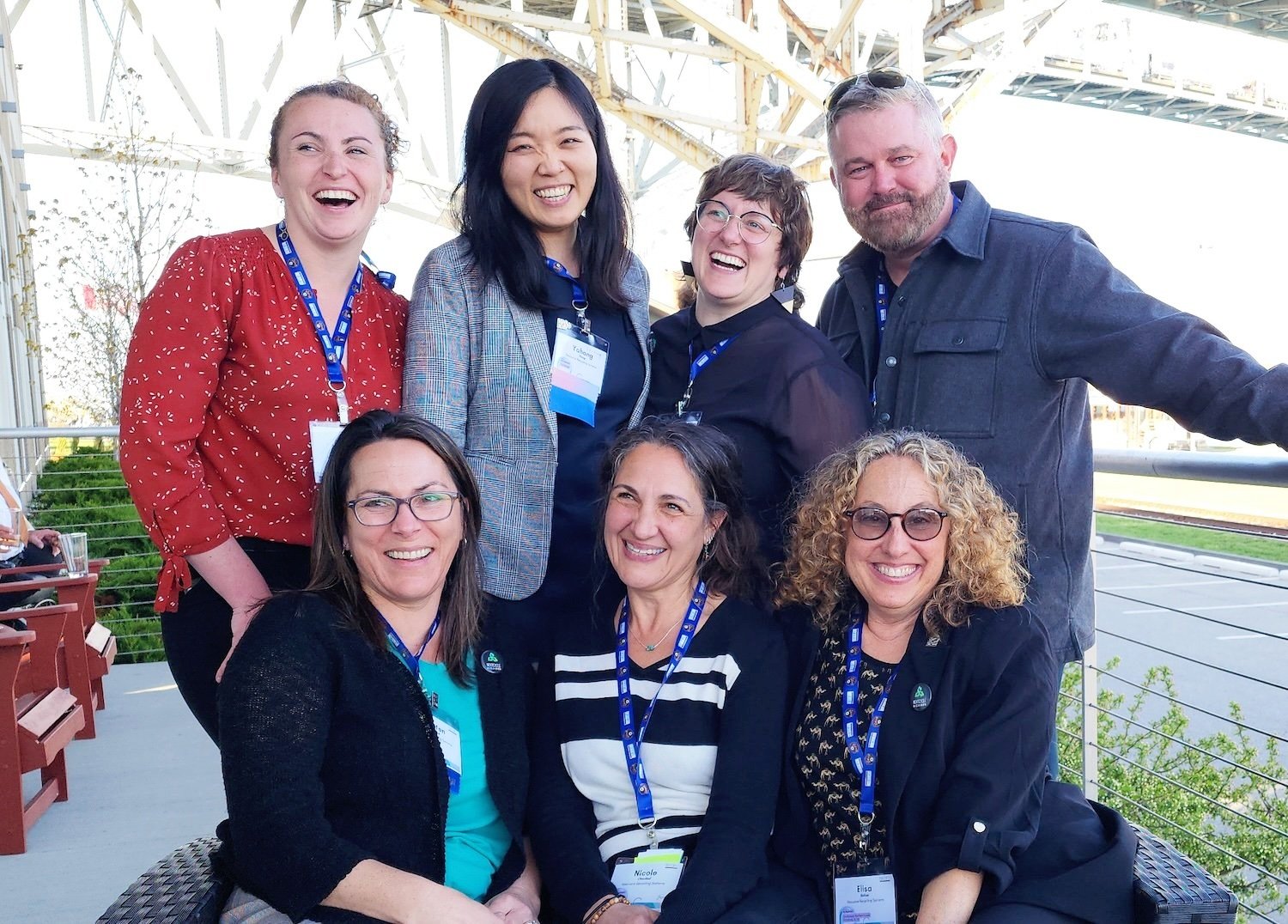Group of 7 people smiling