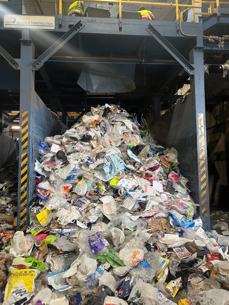Photo of recyclable materials pile at the recycling facility