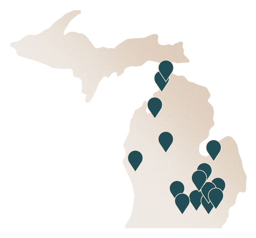 Map of Michigan with icons demonstrating where RRS staff live in Michigan, mostly throughout the lower peninsula