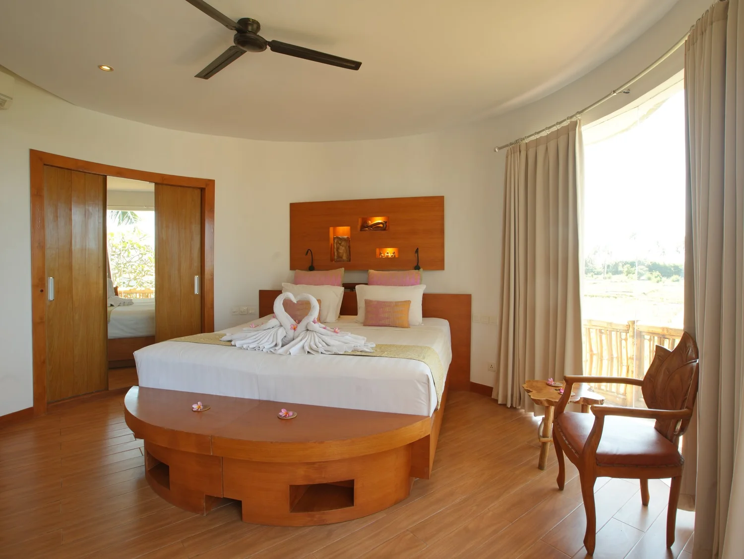 Single room with king bed and rice field view