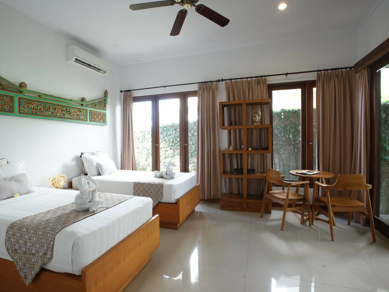 Twin share room set up with two single beds