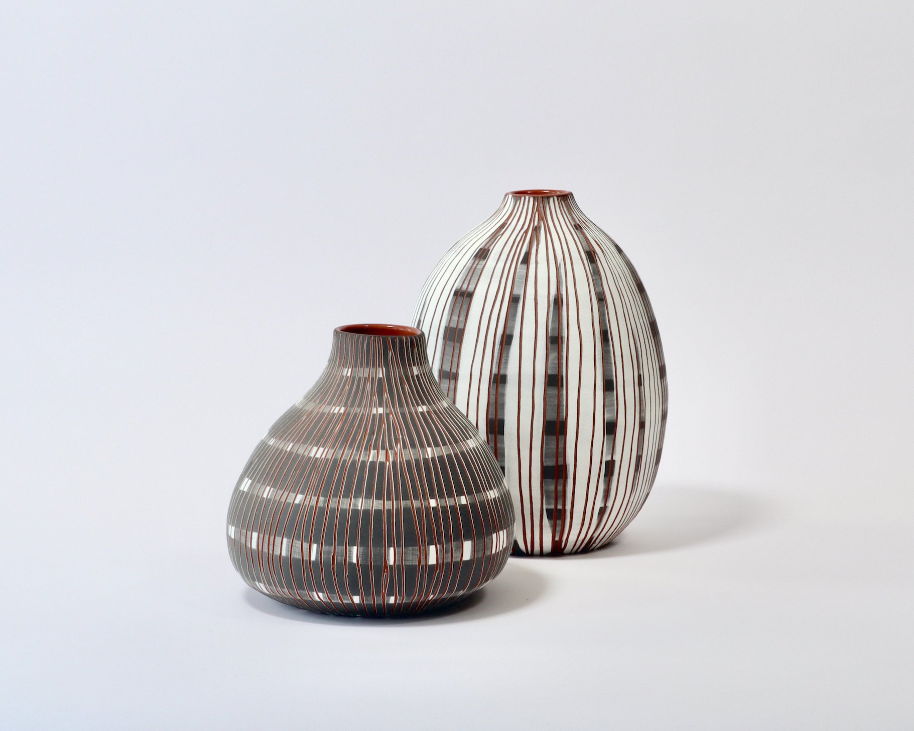 'Allure', 2022, wheel-thrown terracotta with slip, underglaze and glaze, pair - 130 h
x 140mm d, 195 h x 145mm d