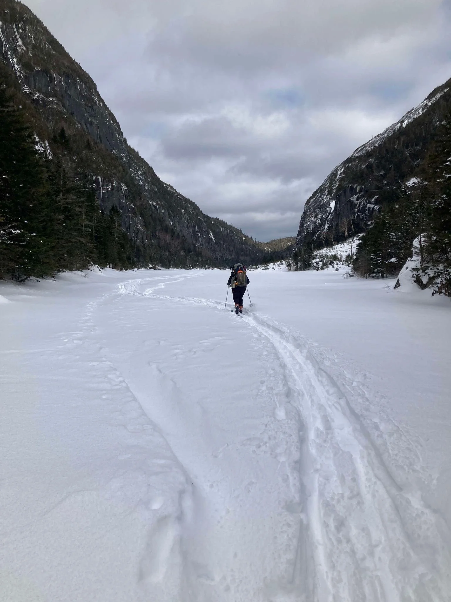Traversing Avalanche Lake, 2024.