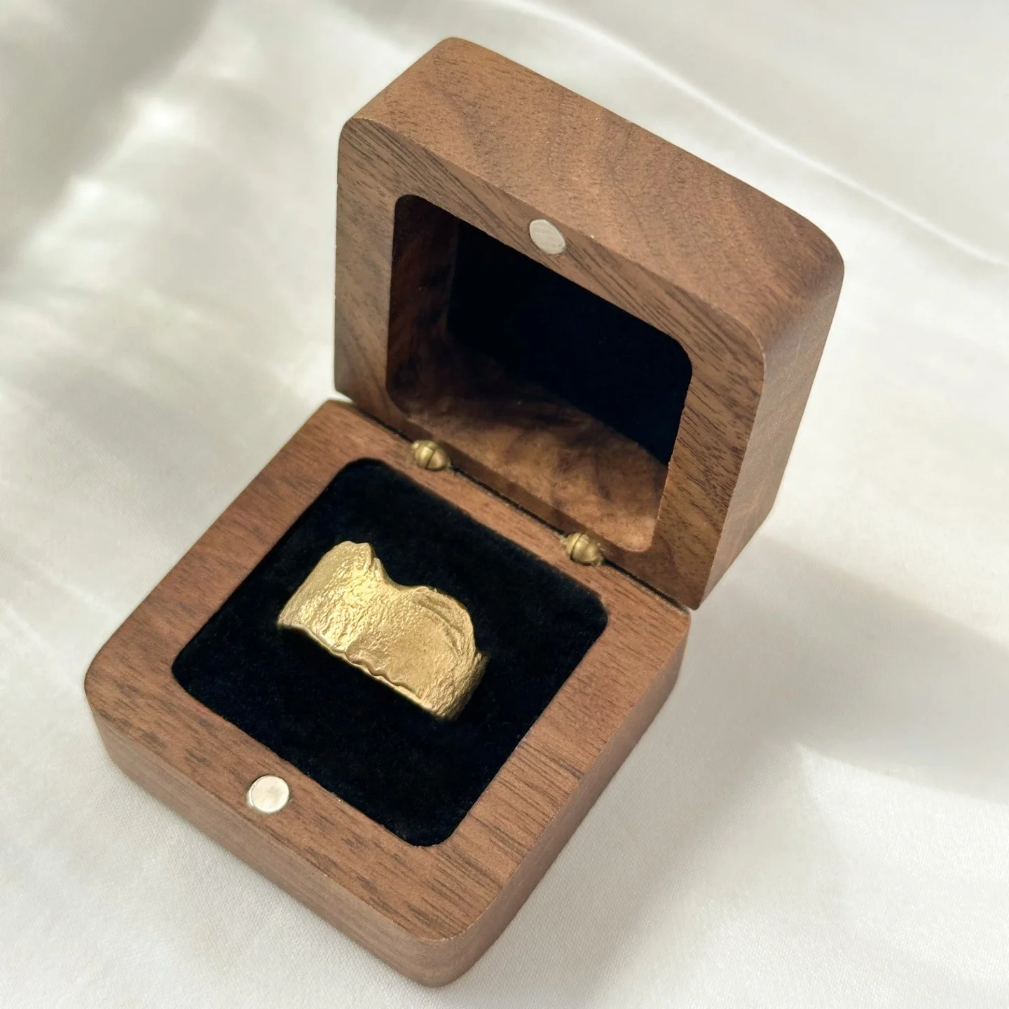 Organic reticulated textured gold ring in ringbox.jpg