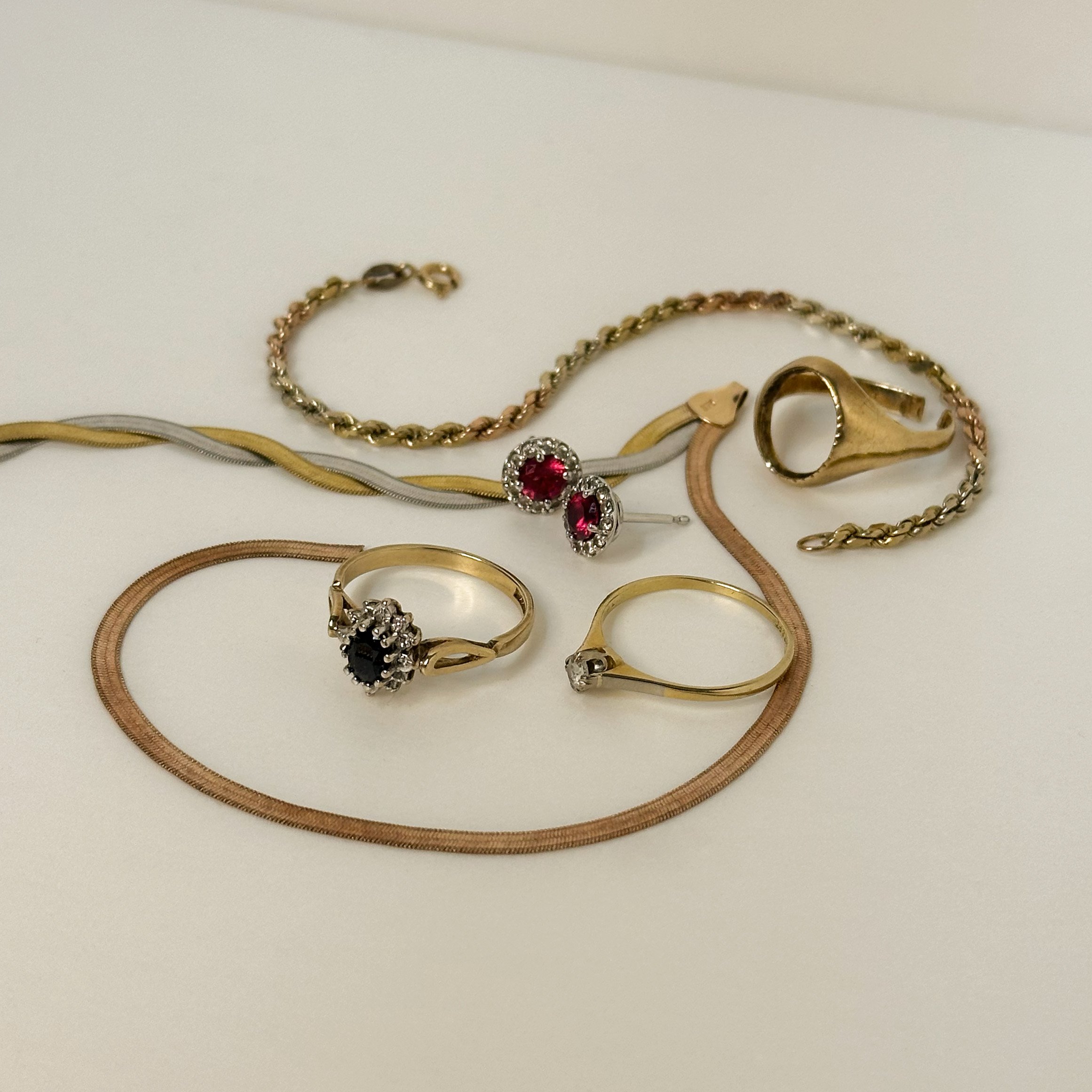 Collection of inherited family jewellery before transformation.jpg