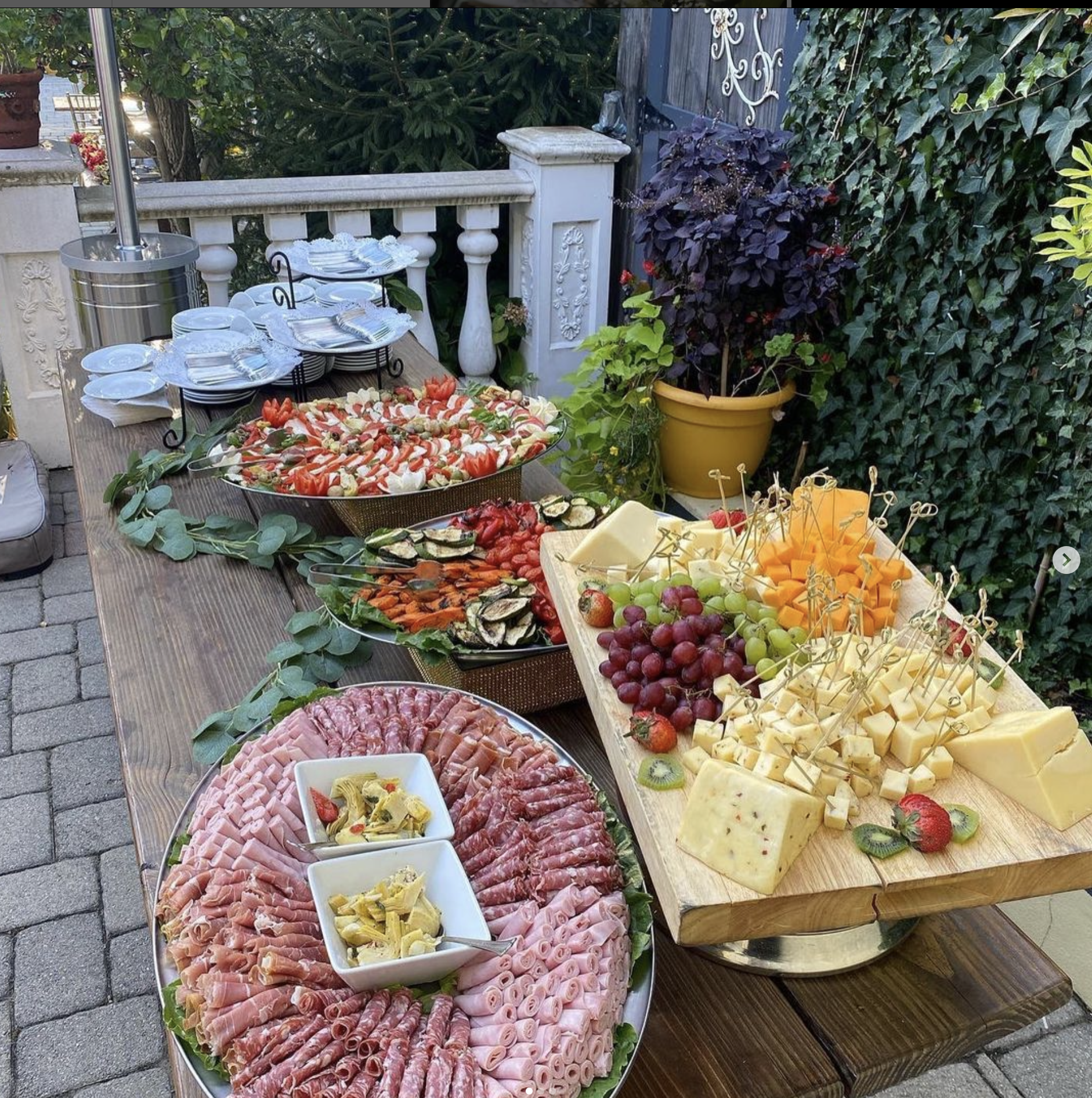 Exclusive antipasto charcutieboard, grilled vegetables and caprese salad