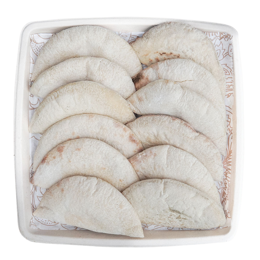 A white container filled with folded, partially toasted pita bread.