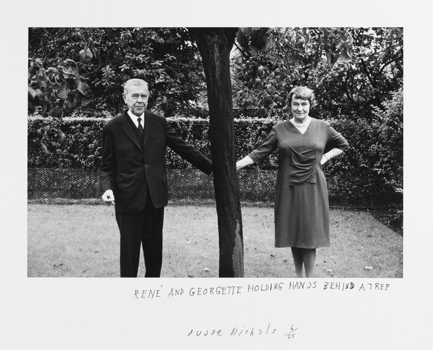 Rene and Georgette Holding Hands Behind a Tree, 1965