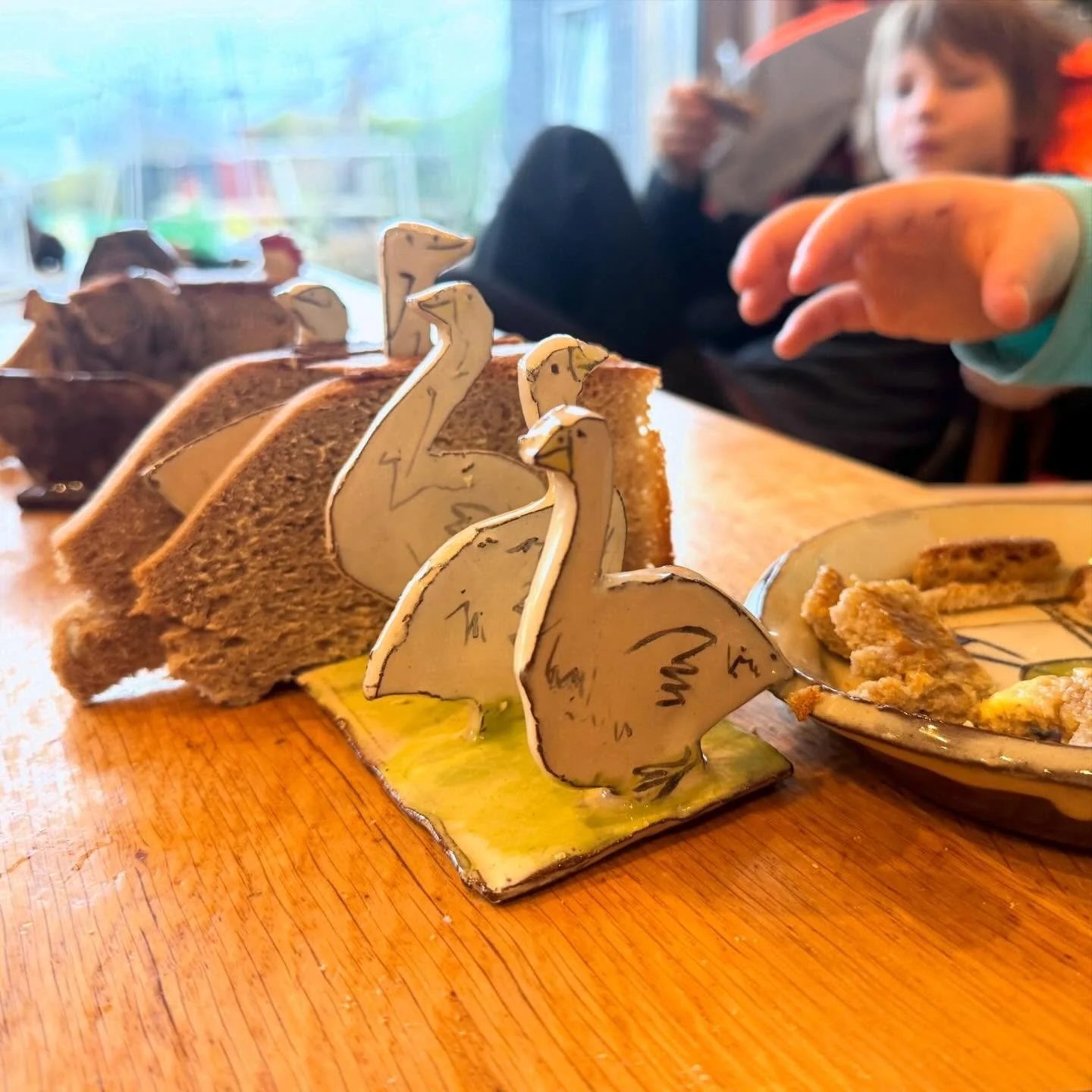 A very exciting breakfast in our house today.

The kids ate toast from the toast racks they made themselves!

They made them by cutting round the same little templates which I used to make my toast racks. Their versions come out much quirkier and mor