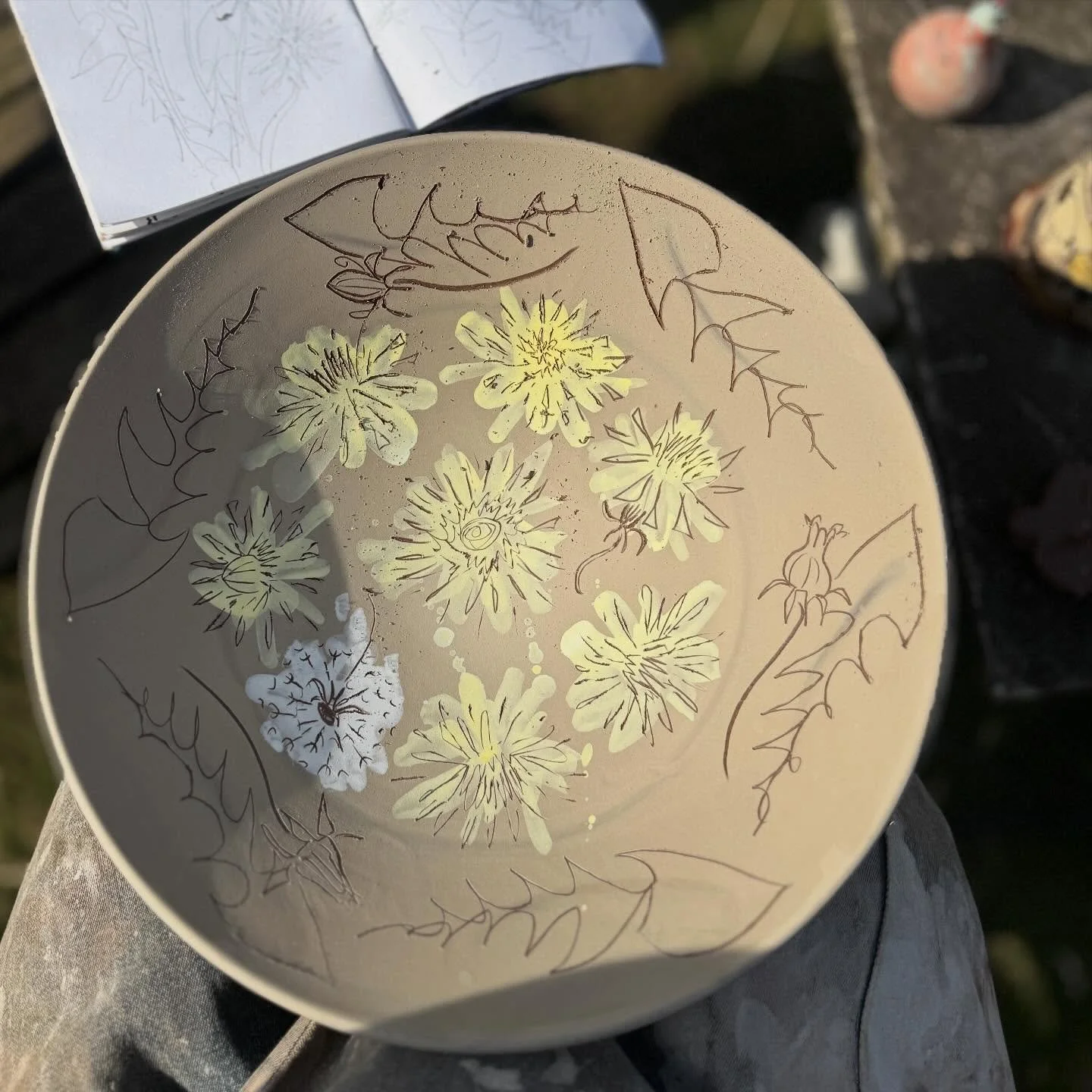 I&rsquo;m such a happy potter - decorating in the sunshine. 

And the sun and breeze are also drying the pots out beautifully in my new found drying spot on top of the chicken run (where neither chickens nor children can bash them).