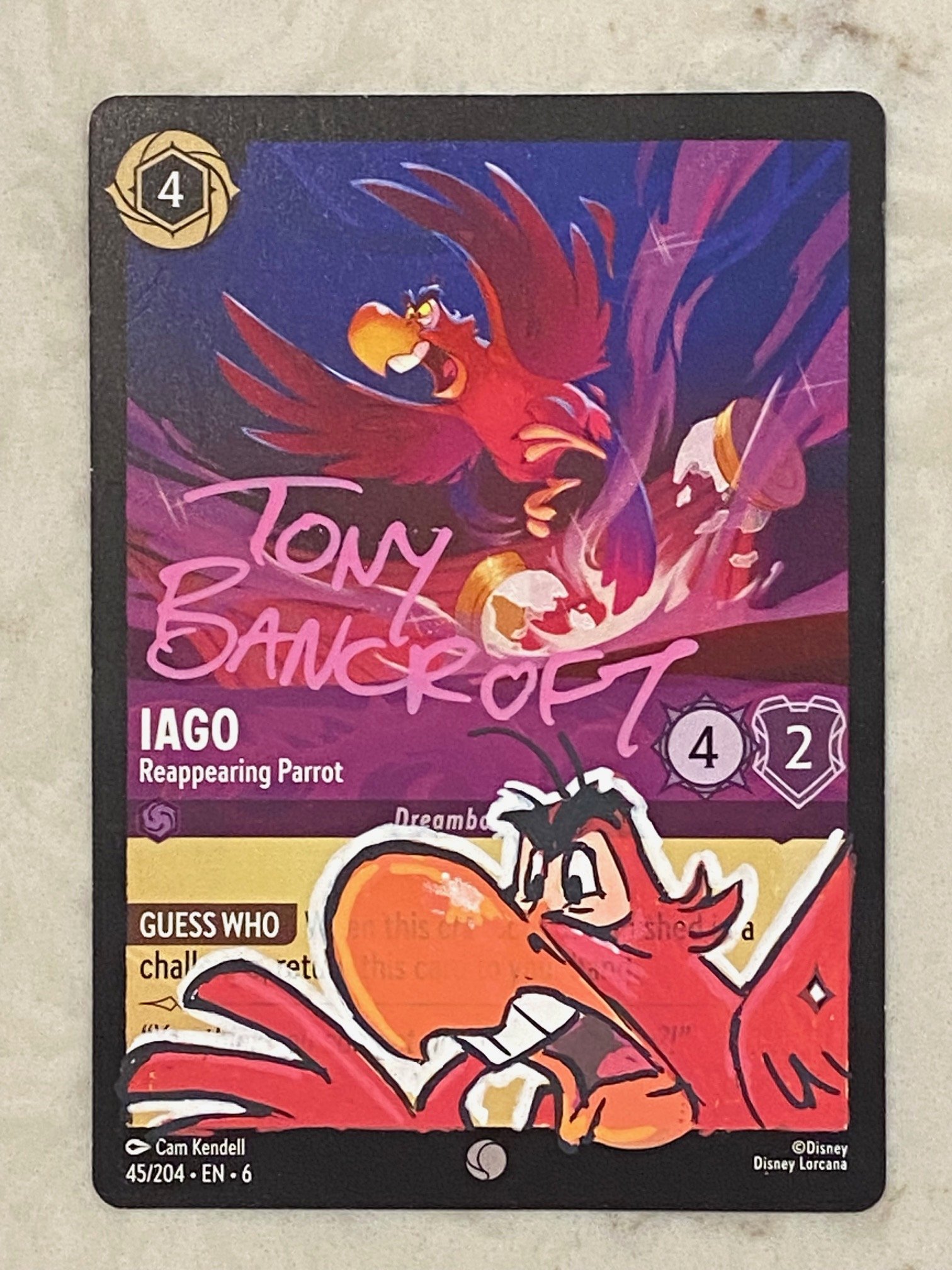 Iago 2-Lorcana card with original art by Tony Bancroft