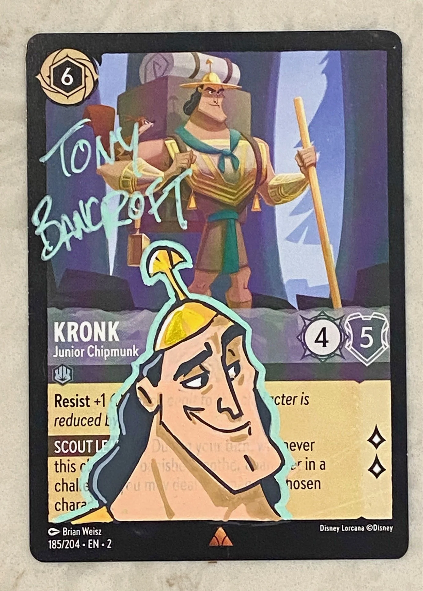 Kronk 2-Lorcana card with original art by Tony Bancroft